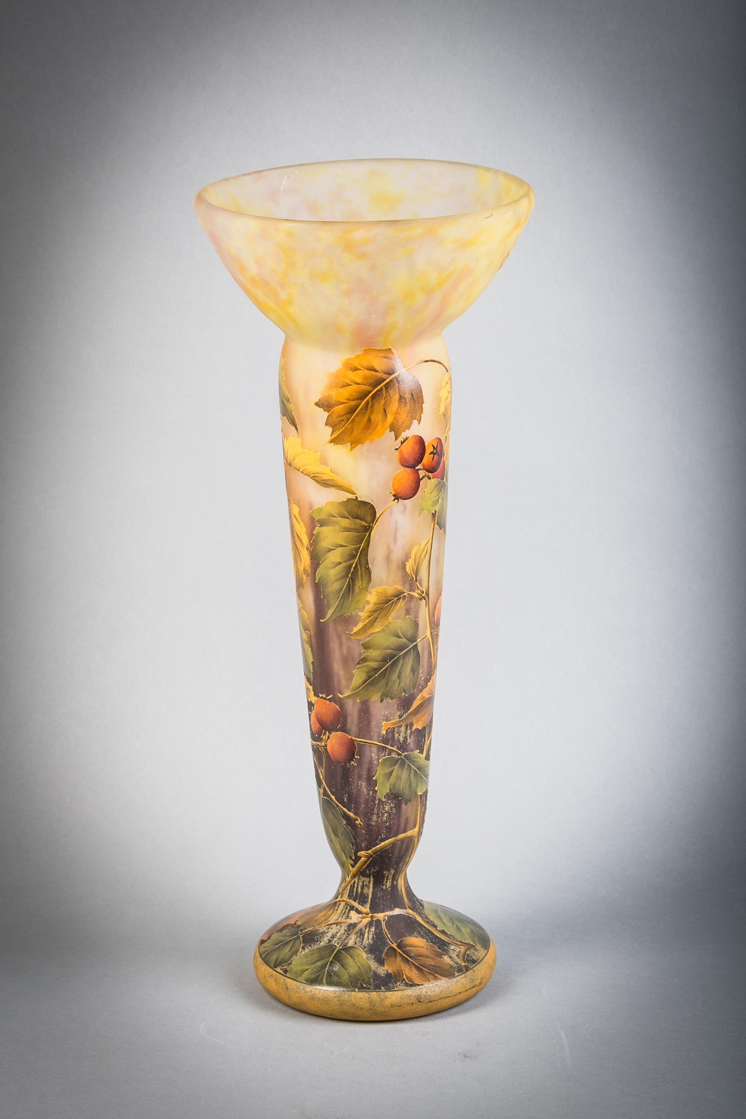 An enameled cameo glass vase circa 1910 signed in cameo Daum Nancy with Cross of Lorraine.