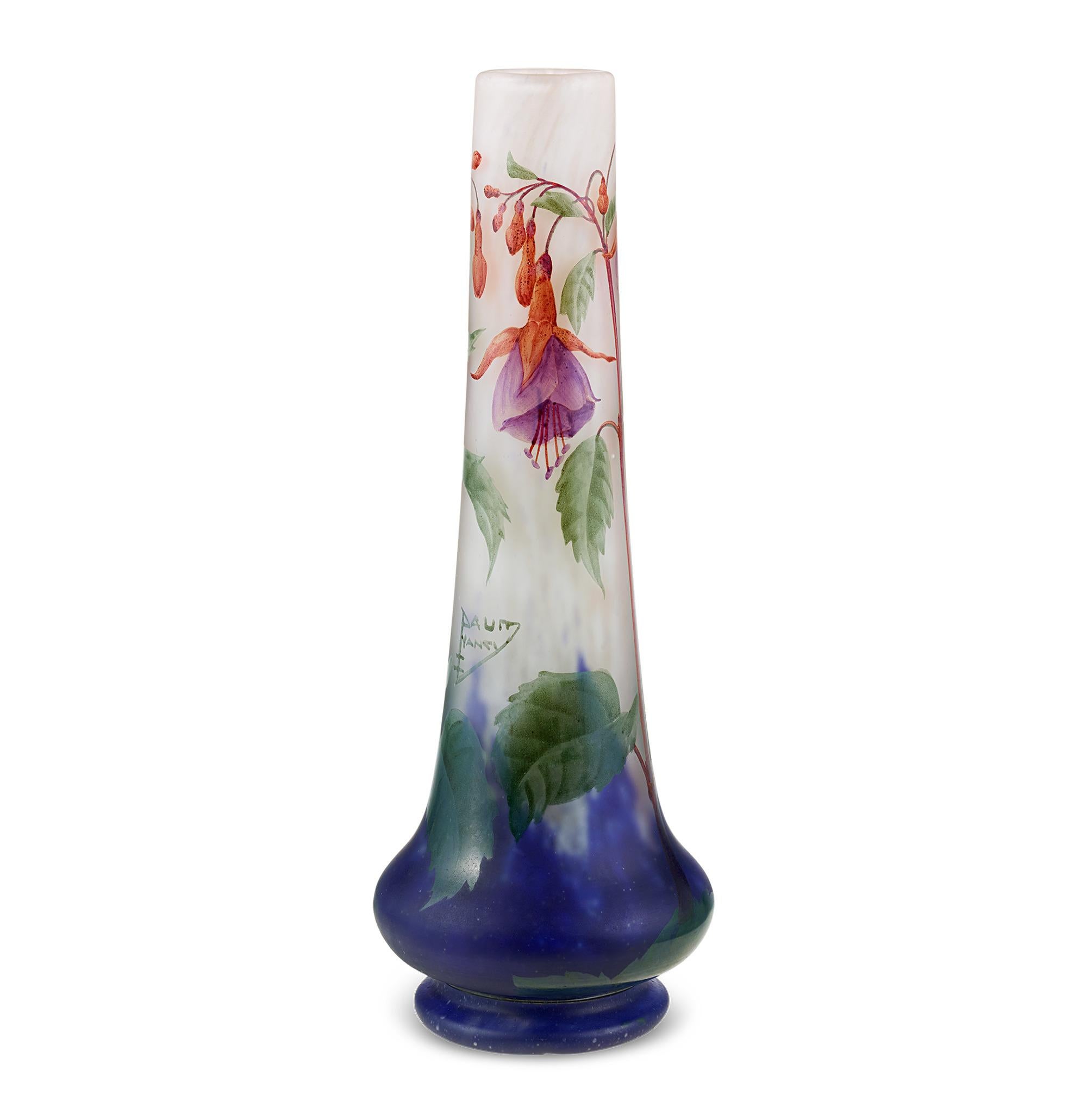 Fuchsia Vase
Daum Nancy
Circa 1900

This exquisite Daum Nancy vase is a masterwork of Art Nouveau glassmaking, crafted around the turn of the 20th century. Featuring a colorless base layered with blue and white powdering, the vase showcases