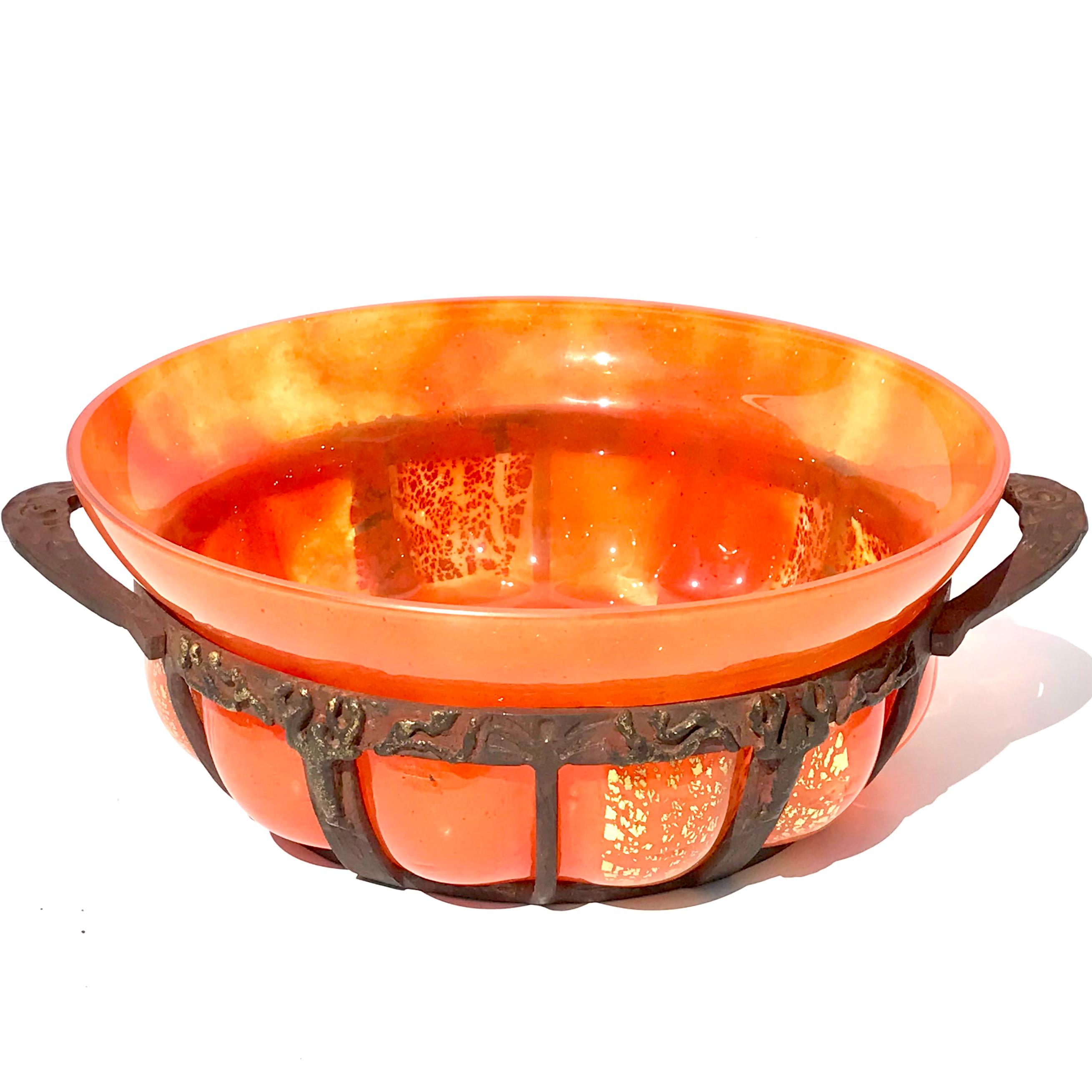 Daum Nancy
Louis Majorelle
Glass mold blown and Cast iron Cache pot or planter Bowl
Circa: 1910
Nancy, France
Condition: Excellent 
Diameter: 13.5 Inches
Height: 4.8 inches

A lovely Art Nouveau Daum Nancy Gold Foil included glass mold blown into a