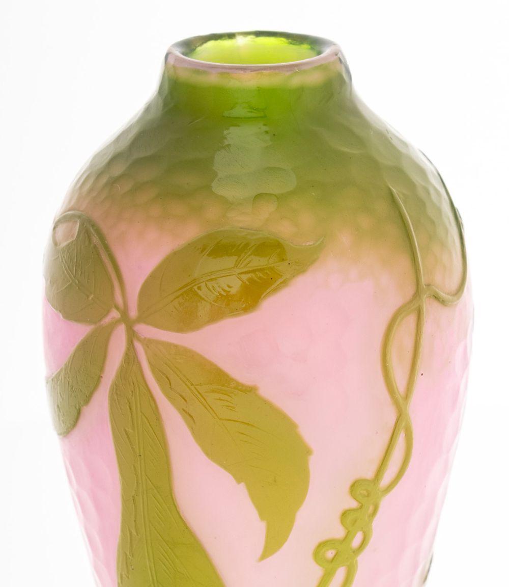 Daum Nancy Martele Ovoid Glass Vase, circa 1919-1923, the pink ground with chartreuse overlay and cameo cut berries and leaves, incised  