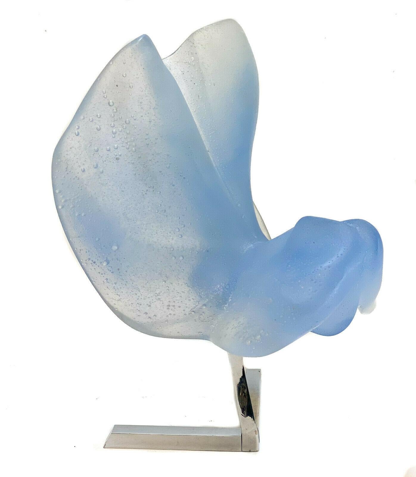 Daum France blue pate-de-verre sculpture, L'Universal by Jean Pierre Niault. An abstract winged sculpture. Comes with chrome stand, name plaque, and Daum box. Limited Edition of 275. 

Weight approximate, 10 lbs 

Measures: Approximate,