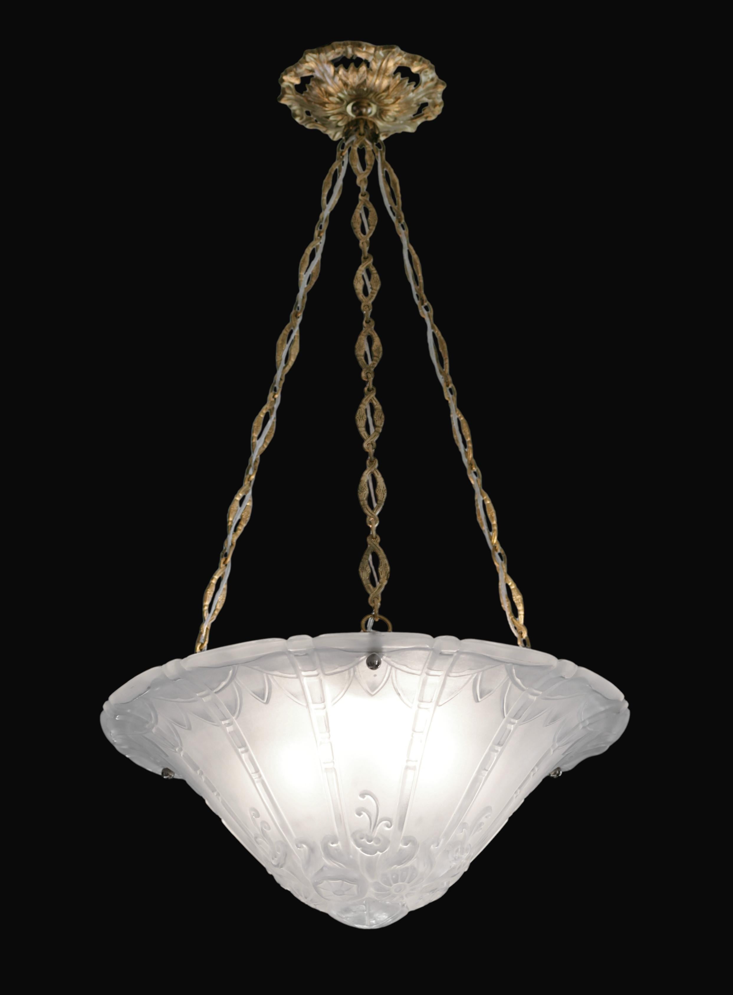 French Art Deco chandelier by Perre D'Avesn at Daum's (Croismare, Nancy), France, early 1930s. Thick molded-pressed satiny glass shade. Very well chiseled. A great model! Hung at is chiseled solid bronze. Height: 28