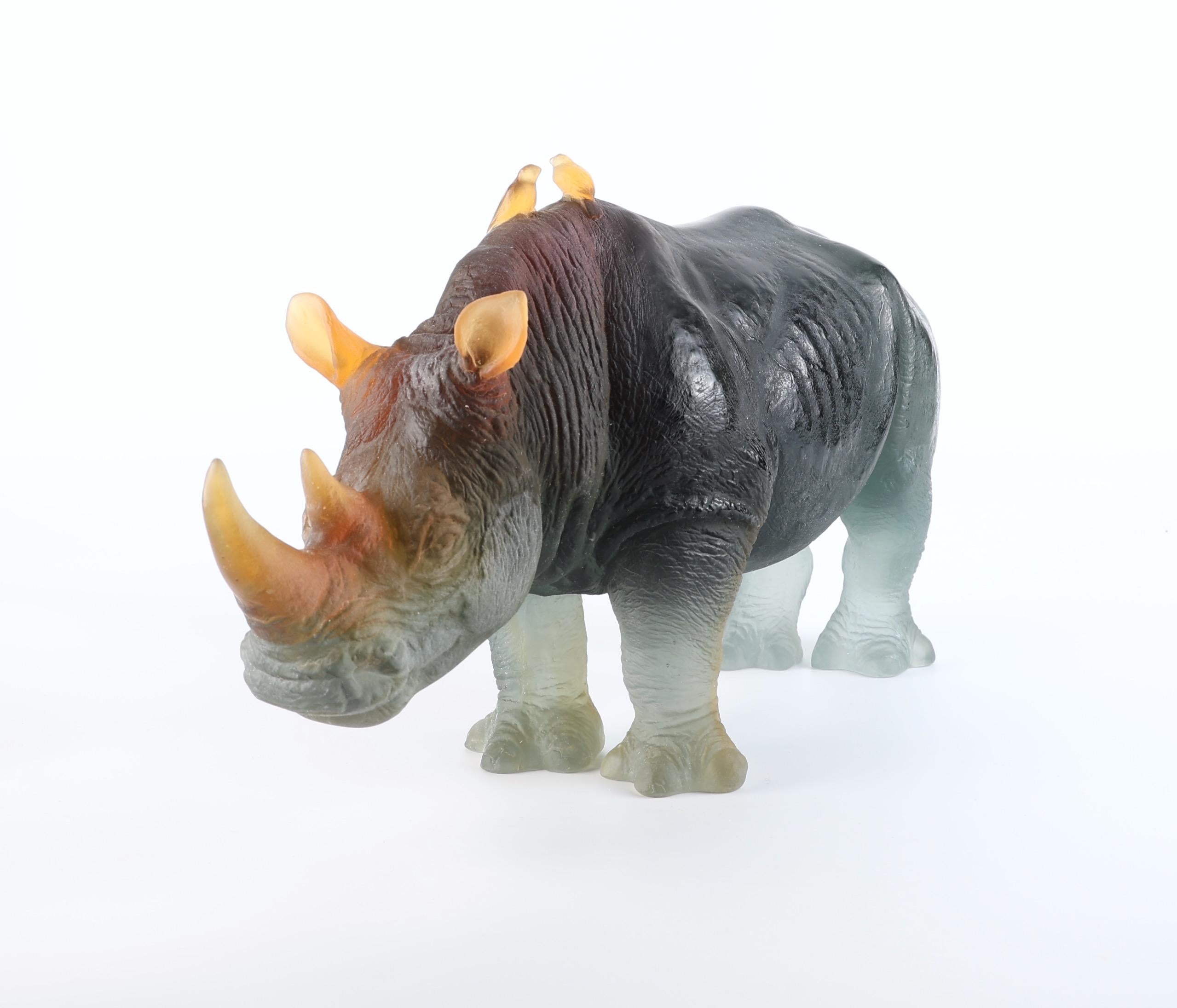 Stunning Daum Rhinoceros in Amber and Grey by Jean-Francois Leroy, Limited Edition 0025/1000.  Best known for his highly realistic bronze sculptures of animals, Jean-François Leroy exhibits his work in numerous galleries and participates in major