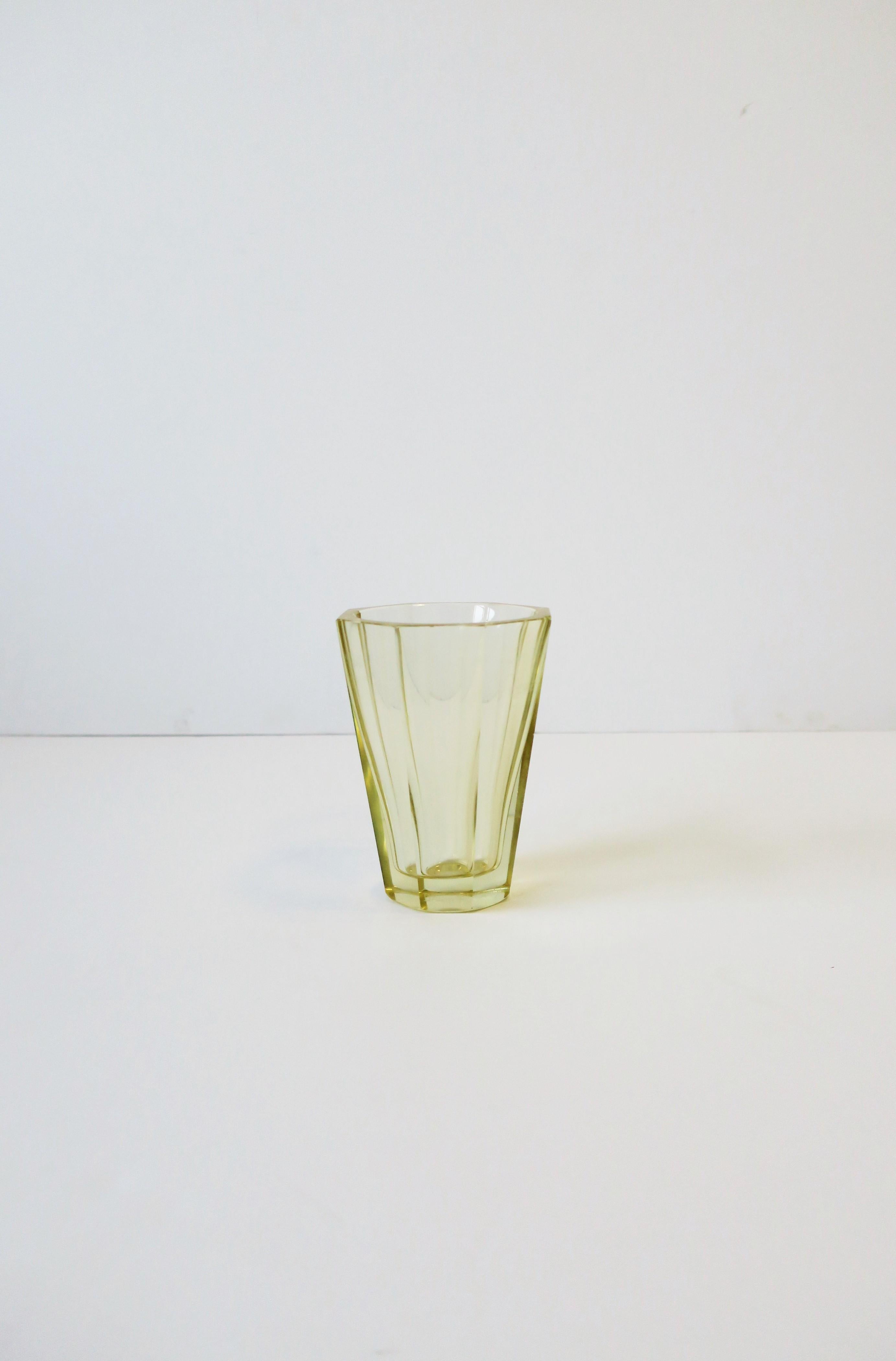 A very beautiful French crystal vase from luxury maker DAUM. Vase is a canary yellow or a 'yellow diamond' hue. Vase has a beautiful modern octagonal exterior shape/design. Vase is signed on outer bottom as show in images #12, 13 and 14; 