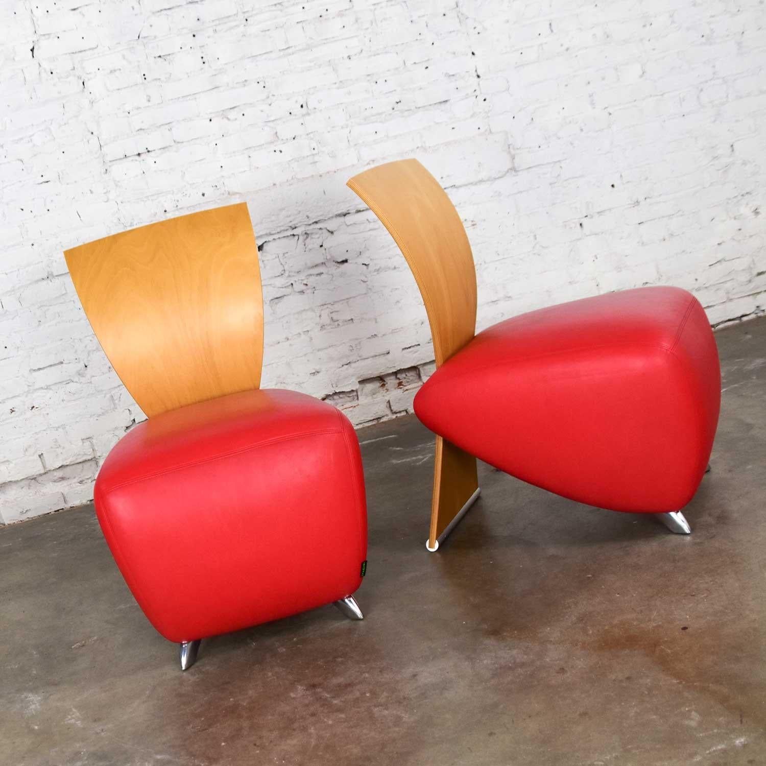 Fabulous pair of Dauphin BOBO Postmodern accent chairs by Dietmar Sharping with red leather seat, polished aluminum feet, and molded maple plywood curved back. Gorgeous almost new condition with age-appropriate wear. Please see photos, circa late