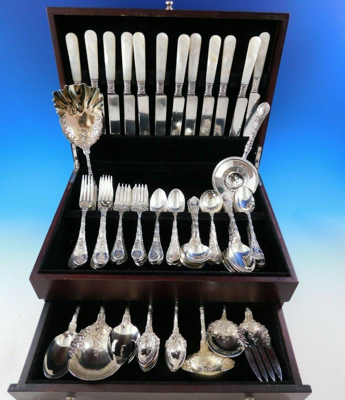 Dauphin by William B. Durgin/Gorham floral sterling silver Flatware set, 92 pieces (including Mother of Pearl knives). First introduced in 1897, this pattern displays flowers that wrap around the entire handle and the excellent craftsmanship that