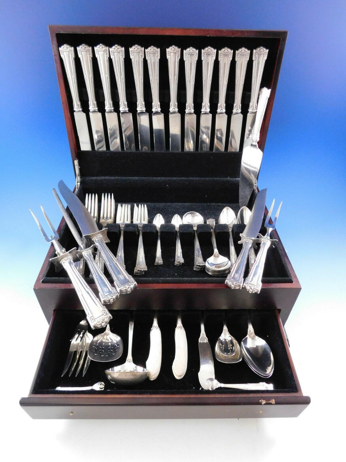 Monumental Dinner Size Dauphine by Wallace sterling silver Flatware set, 101 pieces. This set includes:

12 Dinner Size Knives, 9 1/2