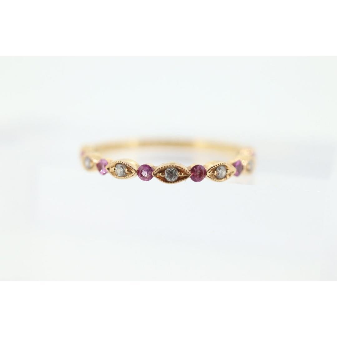 DAUSSI Bague d'anniversaire 18 carats avec saphirs roses et diamants. Bague Henri Daussi en or 18 carats Pour femmes en vente