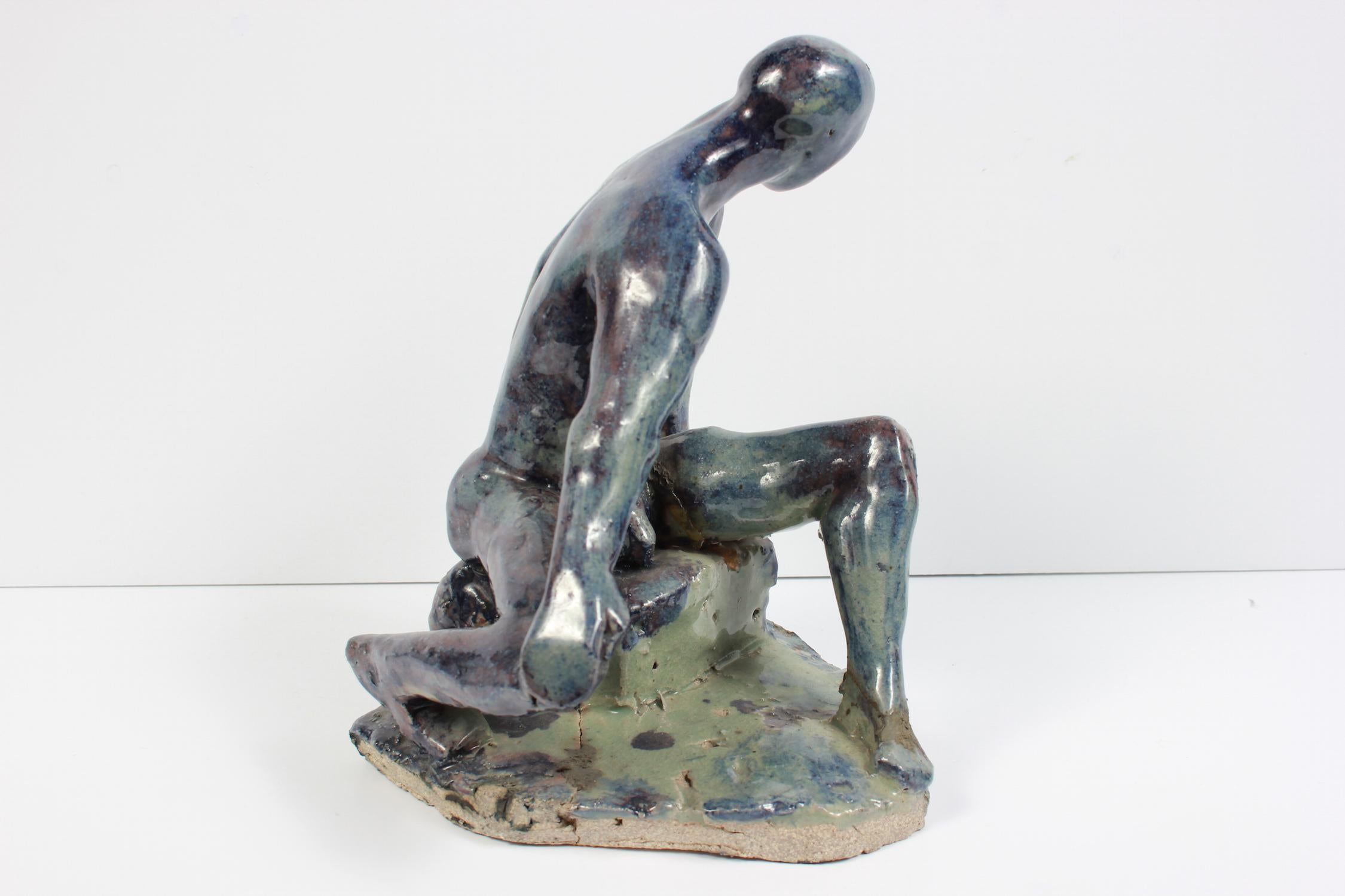 This early 21st century glazed ceramic figurative sculpture of a male nude with blue, moss green, purple, gray, and brown is by Viennese-Southern Californian artist Dave Fox (1920-2011). Fox received his BFA, MA and MFA from California State