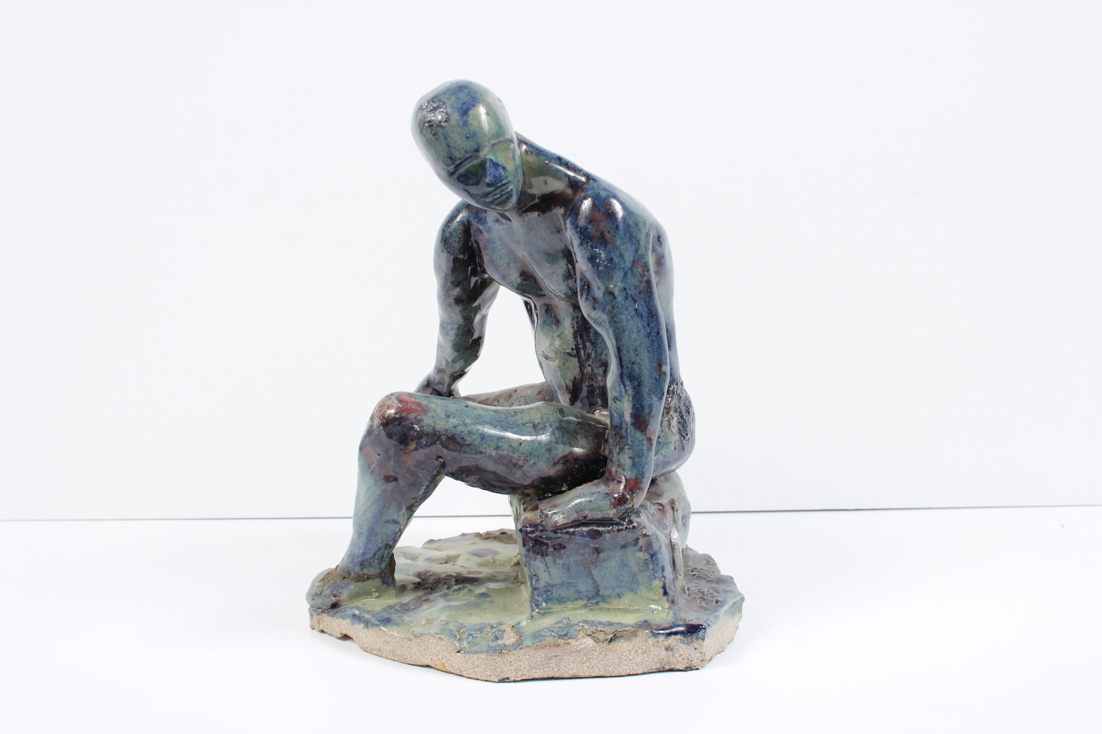 Dave Fox Nude Sculpture - Seated Male Figure Ceramic Sculpture with Blue Purple Moss Green Gray and Brown