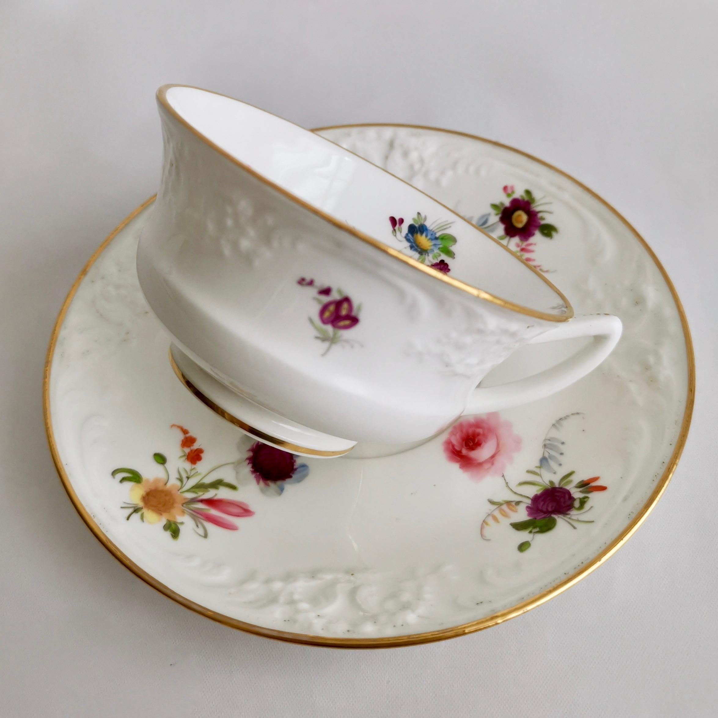 English Davenport Porcelain Teacup, White with Hand Painted Flowers, circa 1820