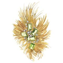 David A. Thomas Peridot
Diamond Spray Brooch, England, 1969