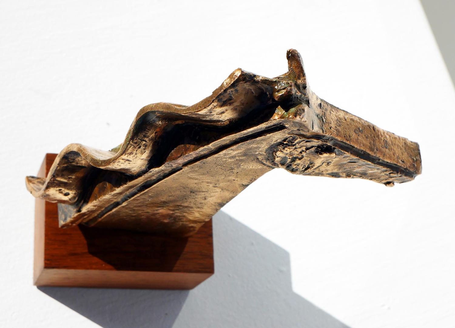 Modernist equestrian horse bust bronze sculpture by Houston, TX artist David Adickes. The sculpture depicts a geometric horse bust that sits on a wooden base. The piece is signed by the artist on the side. 

Artist Biography: Born (1927) and raised