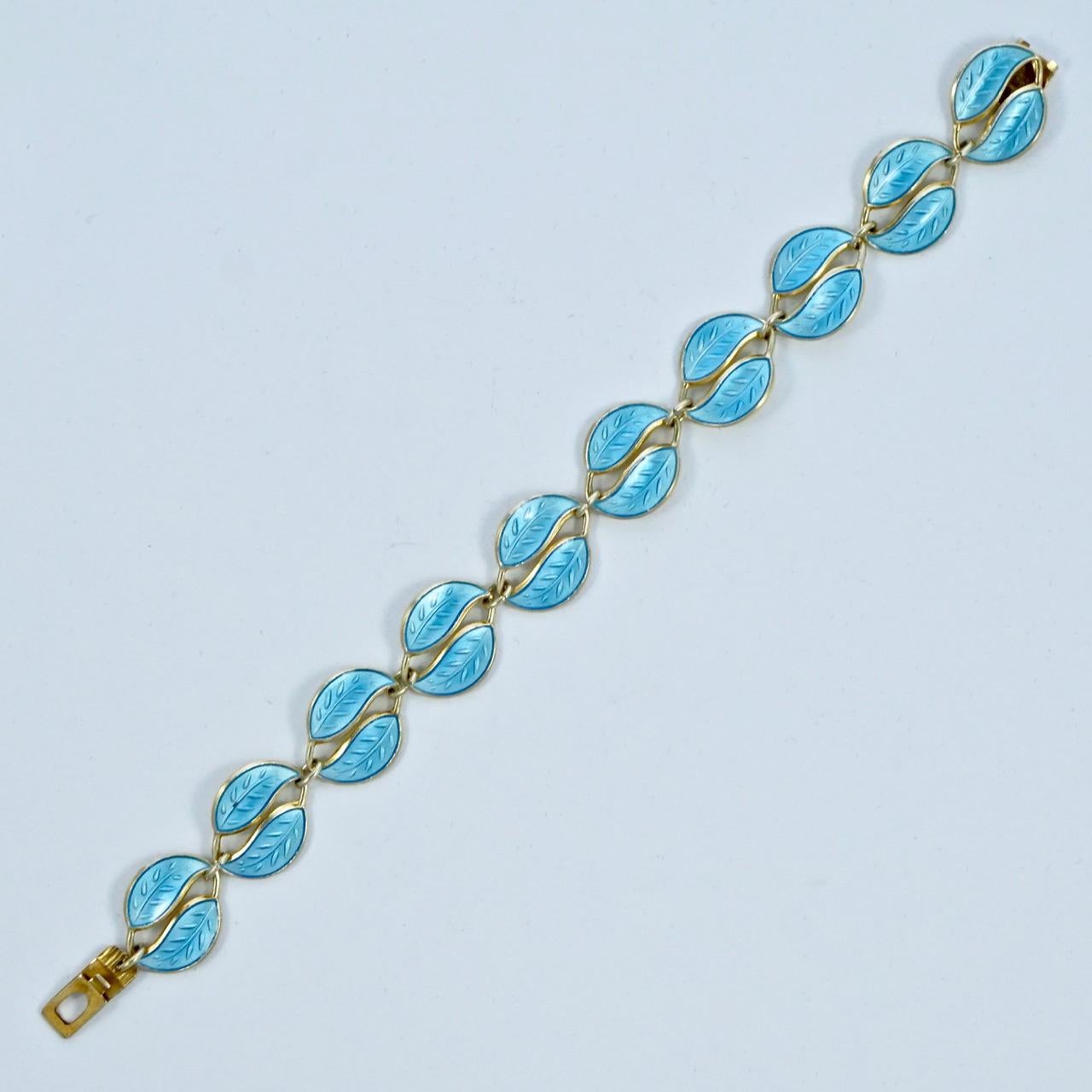David Andersen Norway gold plated sterling silver detailed double leaf bracelet, with lovely sky blue enamel. Measuring length 17.8cm / 7 inches by width 1.3cm / .5 inch. The bracelet is in very good condition.

This is a beautiful sky blue enamel