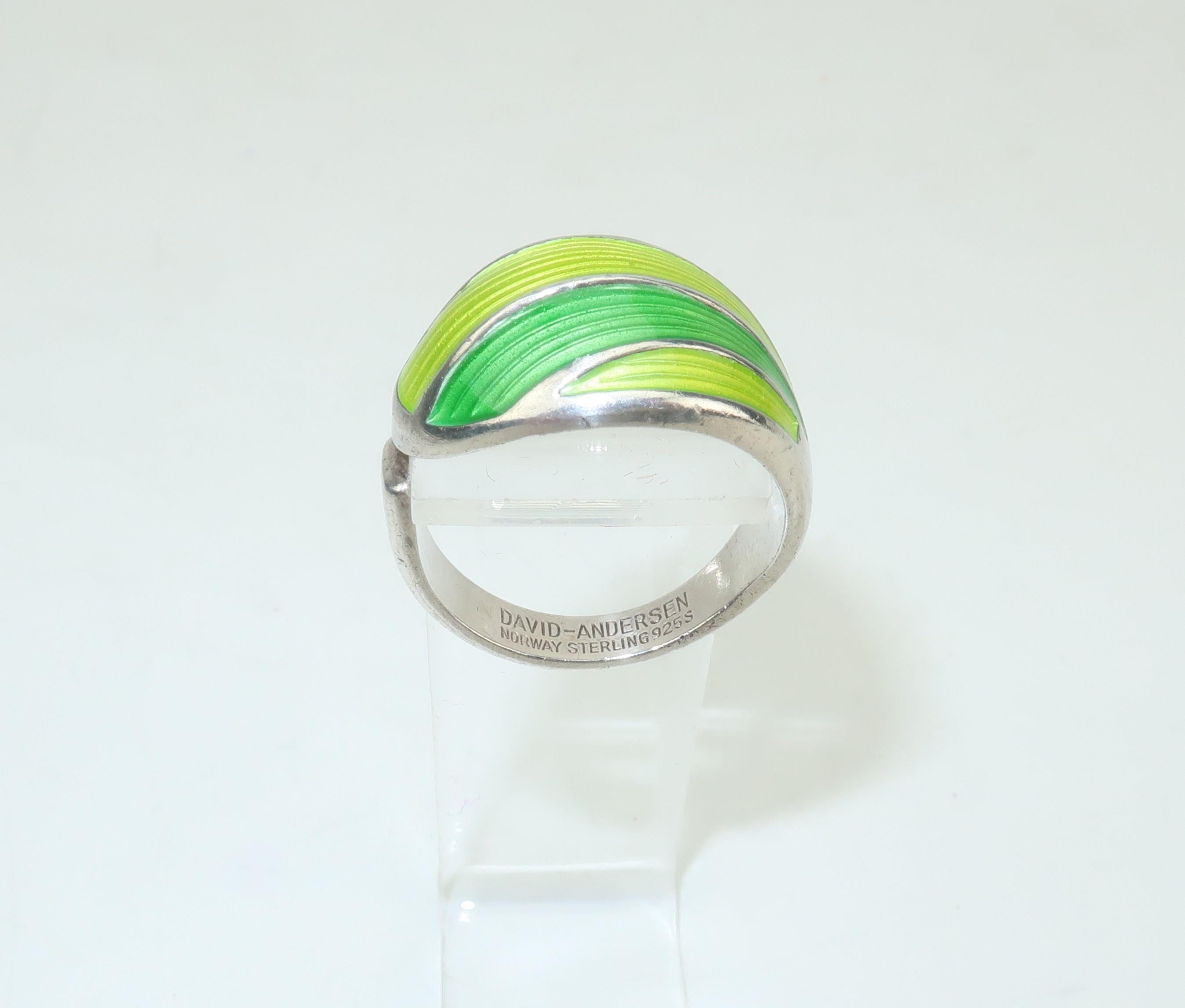 David-Andersen is a name synonymous with Norwegian jewelry and fine metal works starting in the late 1800's and continuing with modernist designs of the mid 20th century.  This domed ring is fabricated from sterling silver and accented with two