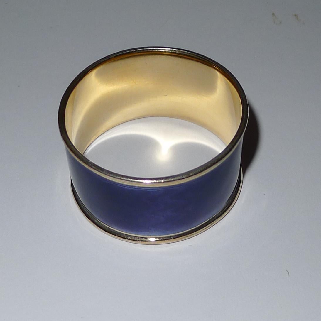 A stunning and rarely found Norwegian napkin ring made by the famous silversmith, David Andersen. 

The ring is made from sterling silver, stamped 925 (925/1000) and lavishly washed in gold; together with the maker's mark for David Andersen.  This