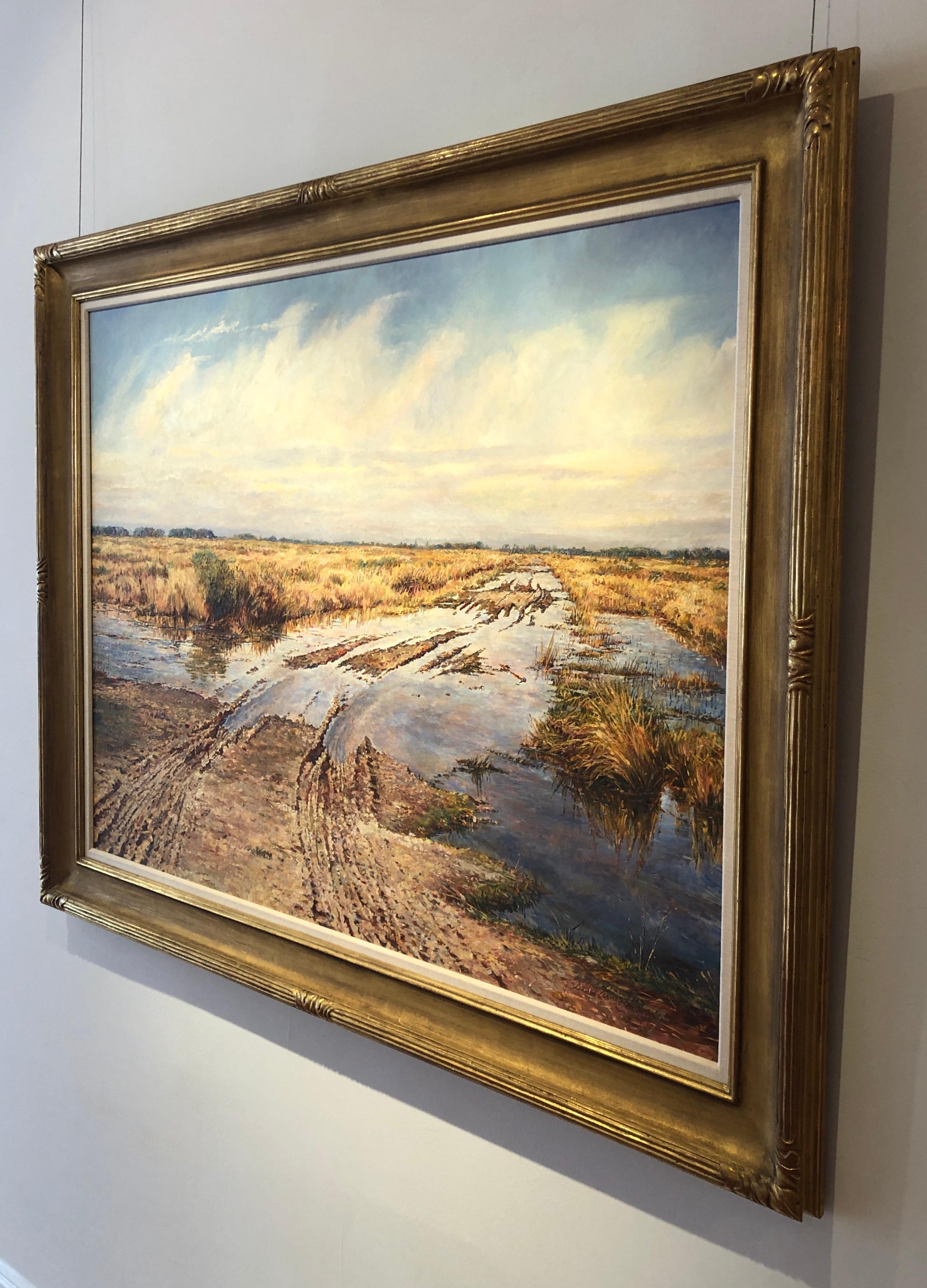 Winter landscape oil painting of a field with tire tracks by the late great American painter, David Armstrong. 
Framed dimensions are 44 1/2 x 56 inches.