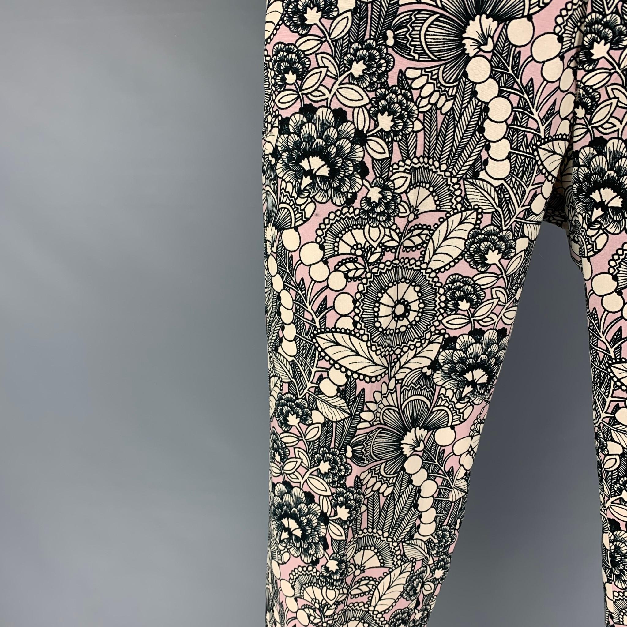 DAVID AUGUST dress pants comes in a multi-color print wool / silk featuring a slim fit, side tabs, and a zip fly closure. 

Excellent Pre-Owned Condition.
Marked: Size tag removed
Original Retail Price: $895.00


Measurements:

Waist: 32 in.
Rise:
