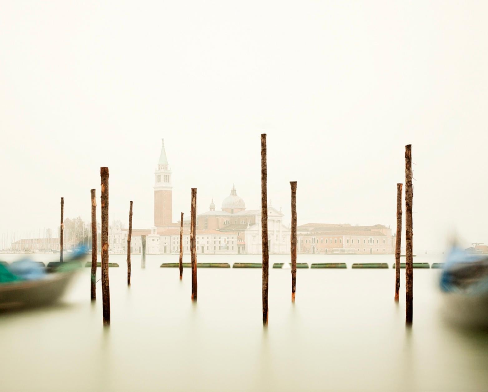 Title: San Giorgio Maggiore with Gondola Station, Venice

David Burdeny (b. 1968. Winnipeg, Canada) graduated with a Masters in Architecture and Interior Design and spent the early part of his career practicing in his field before establishing