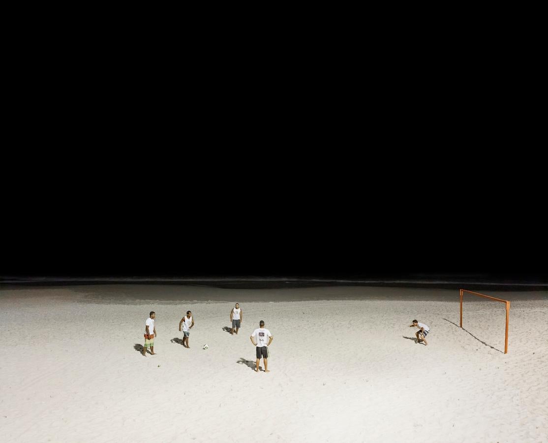 David Burdeny Landscape Print - Soccer Match, Copacabana Beach, Rio de Janeiro, Brazil