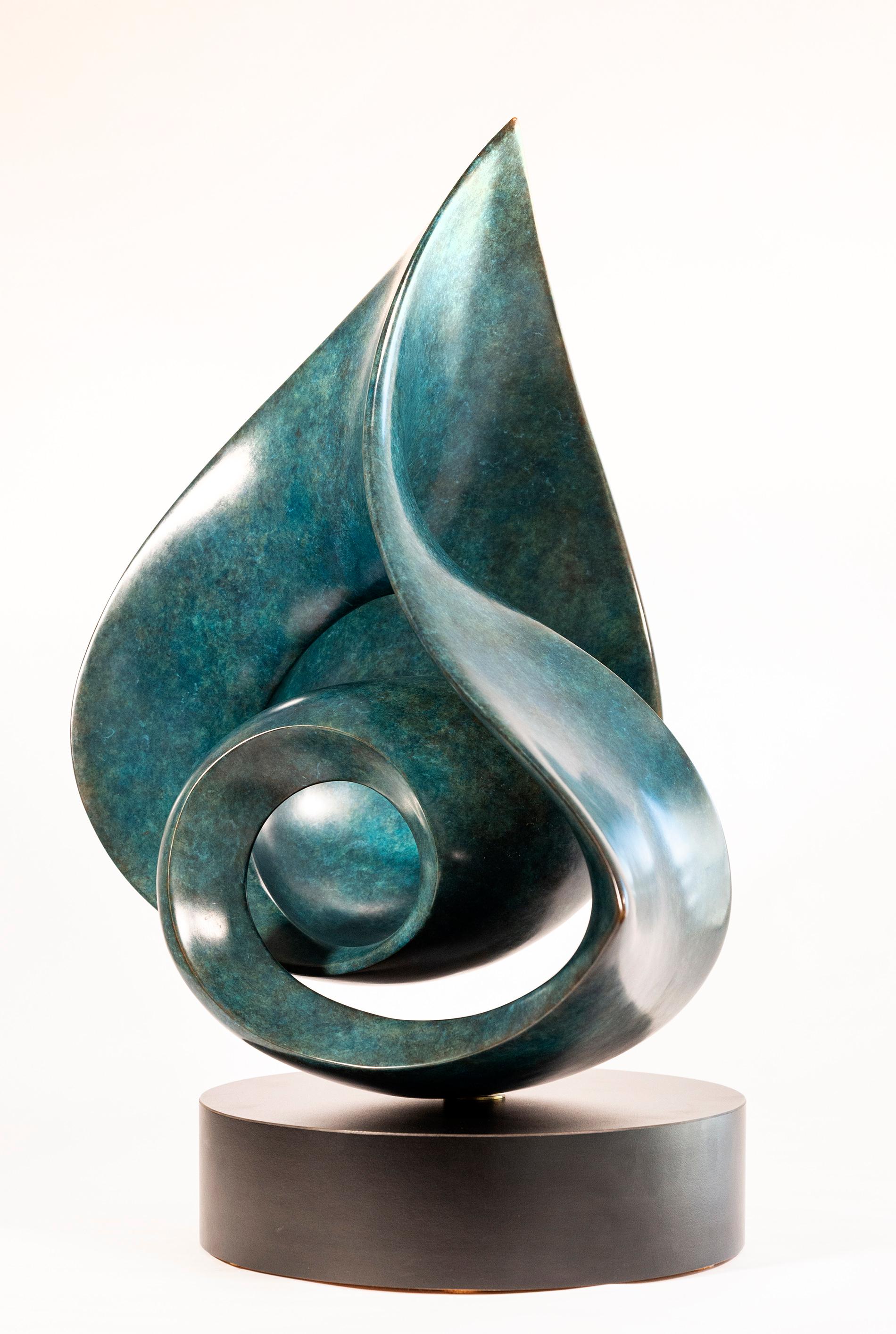 As graceful as a dancer’s form, this contemporary bronze sculpture in a striking deep turquoise patina is by David Chamberlain. Created from one continuous piece, and highly polished, the lustre accentuates the spiralling form and reflects light.