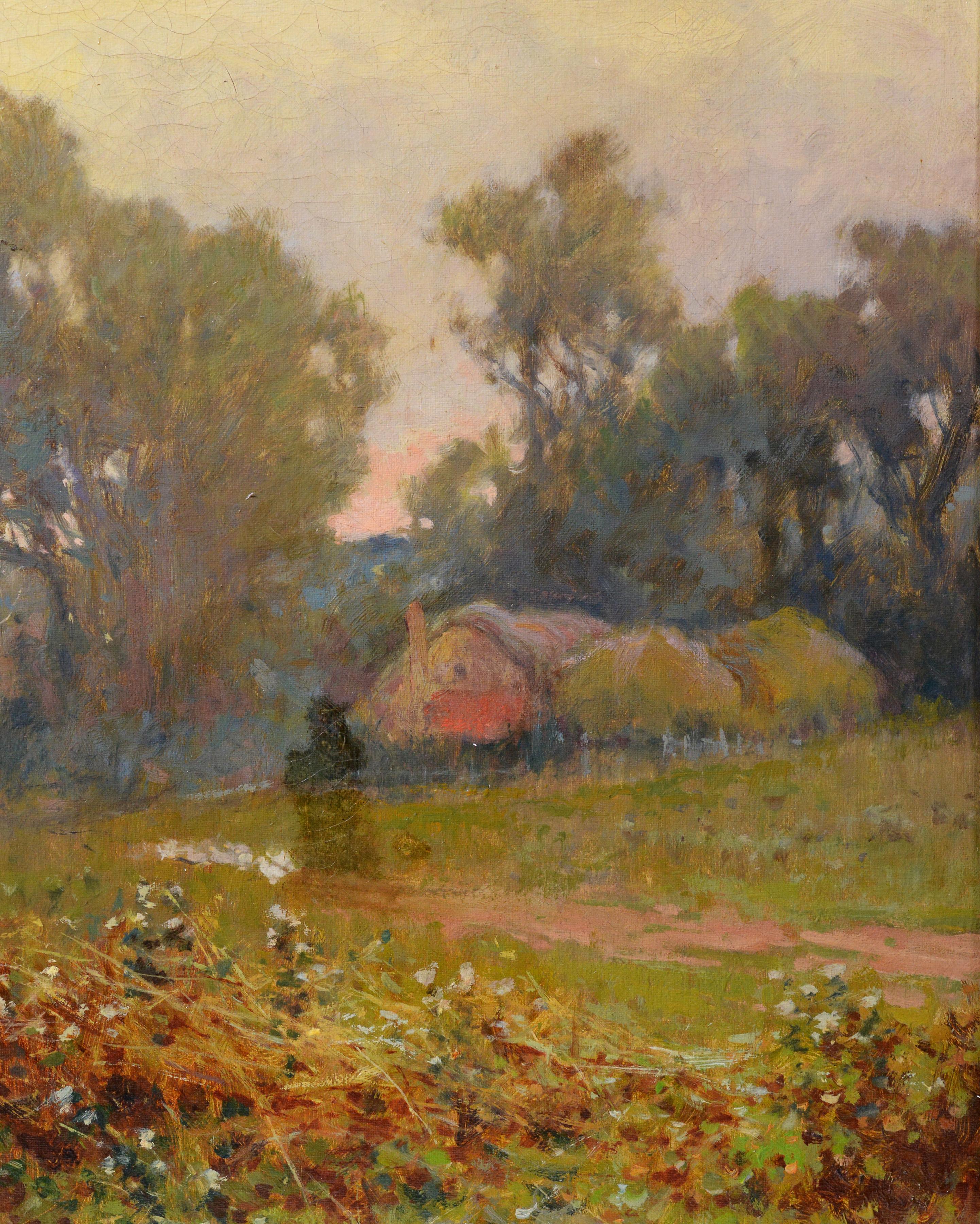 This charming British oil painting by David Charles Jenkins (1867-1916) captures a serene countryside landscape bathed in the gentle glow of sunset. The composition leads the eye along a meandering stream bordered by wild reeds and grasses. In the