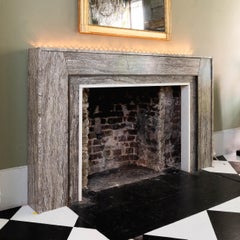 David Collins - A Brown Travertine, Bronze and Statuary Marble Fireplace