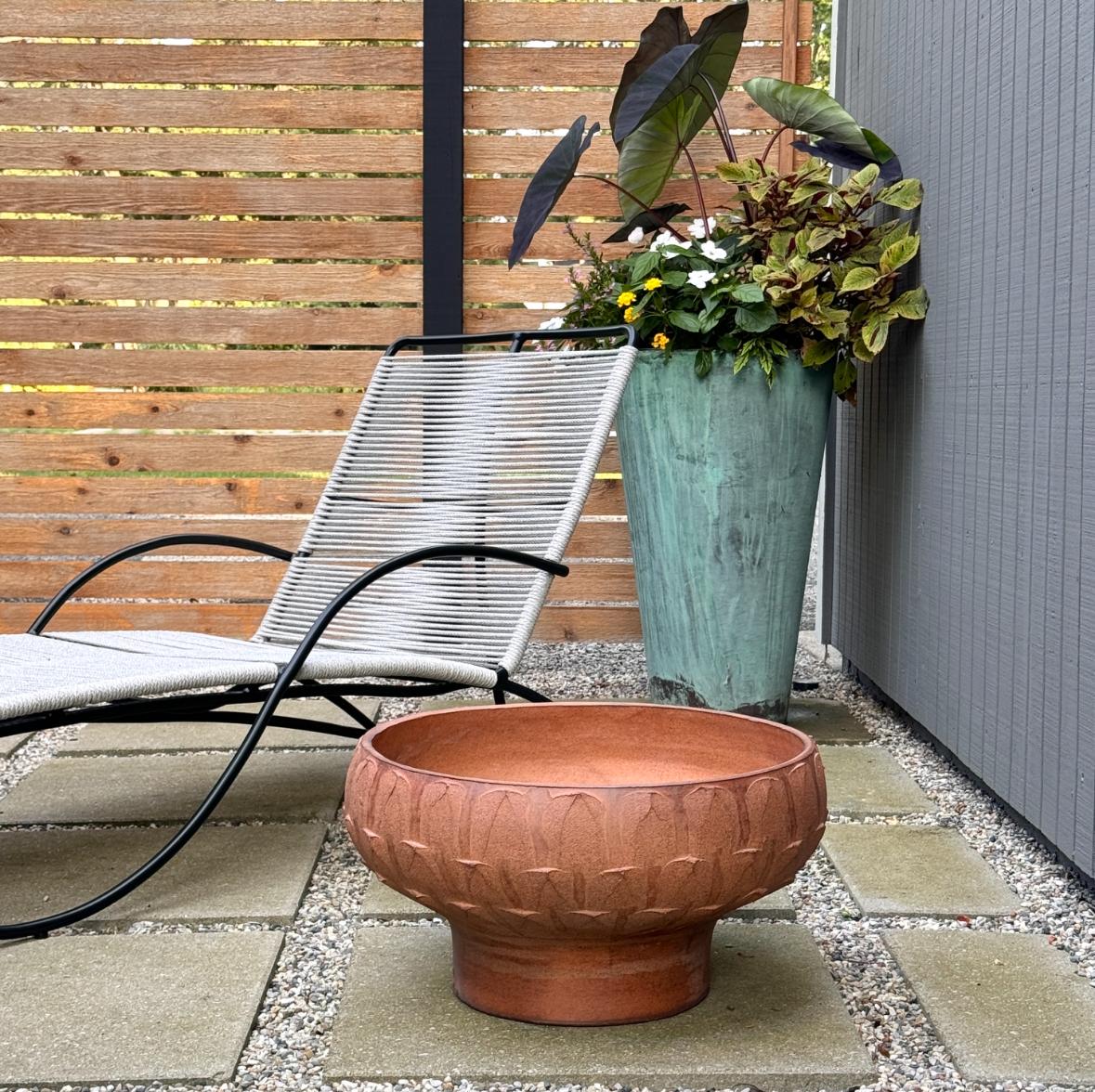 A large stoneware bowl planter by David Cressey for Architectural Pottery circa 1960s

Pro Artisan collection model 4066 unglazed with ribbed texture
21 inch diameter  12 inch height

This vessel has been expertly repaired.  Evidence of restoration