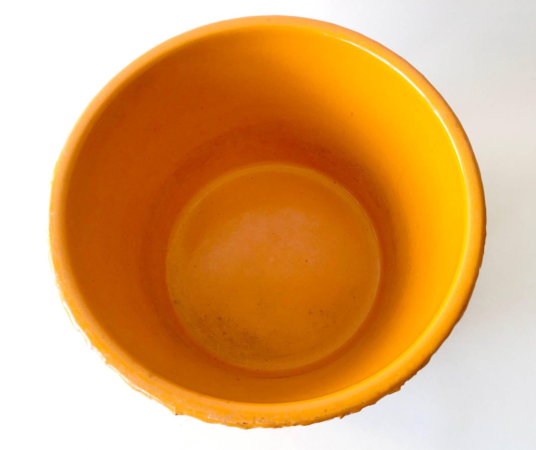 Bright orange glazed planter by David Cressey for Architectural Pottery. Planter measures 6.25