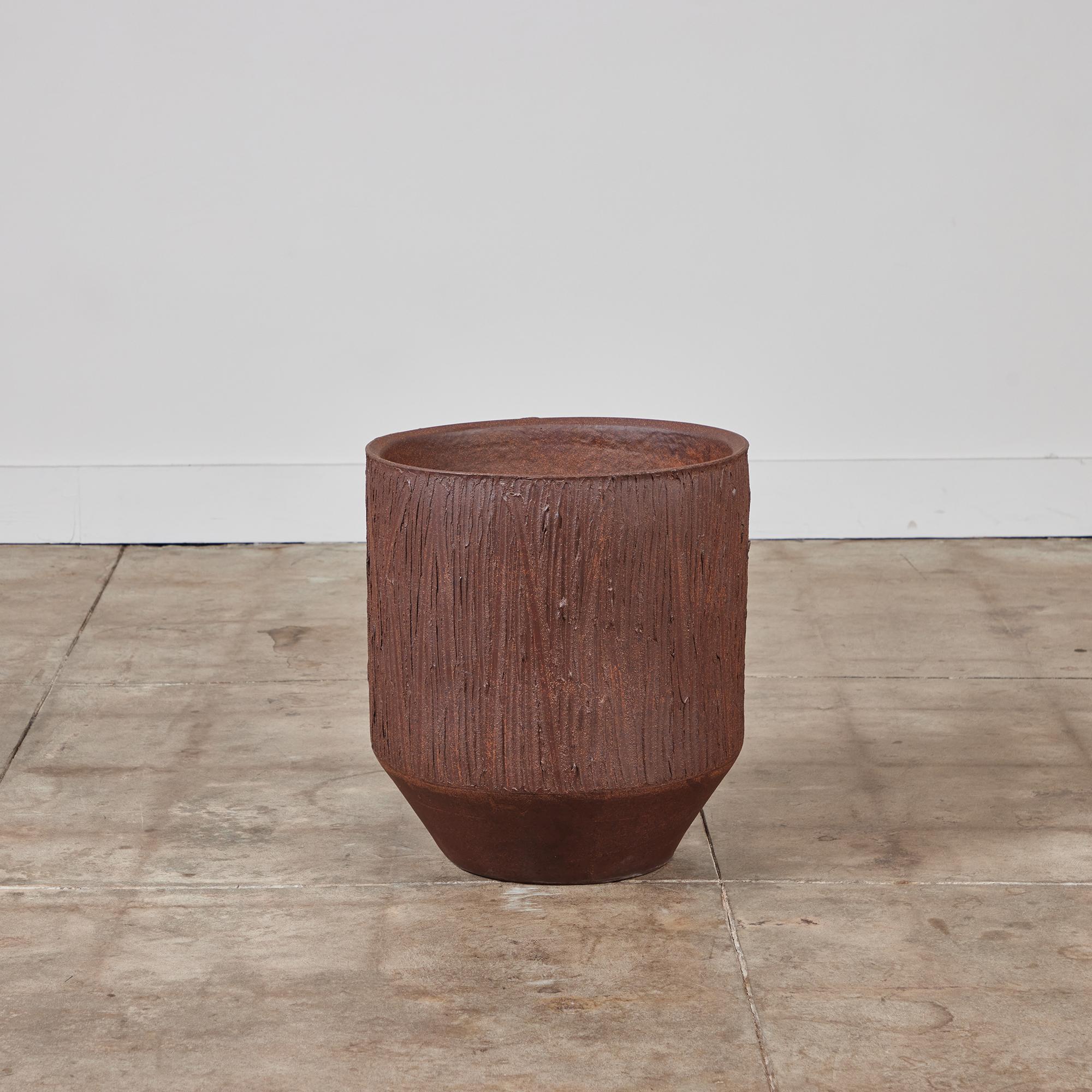 Bullet planter by David Cressey from the Pro/Artisan collection for Architectural Pottery. This stoneware planter has an unglazed interior as well as an unglazed natural warm brown clay exterior with the iconic 