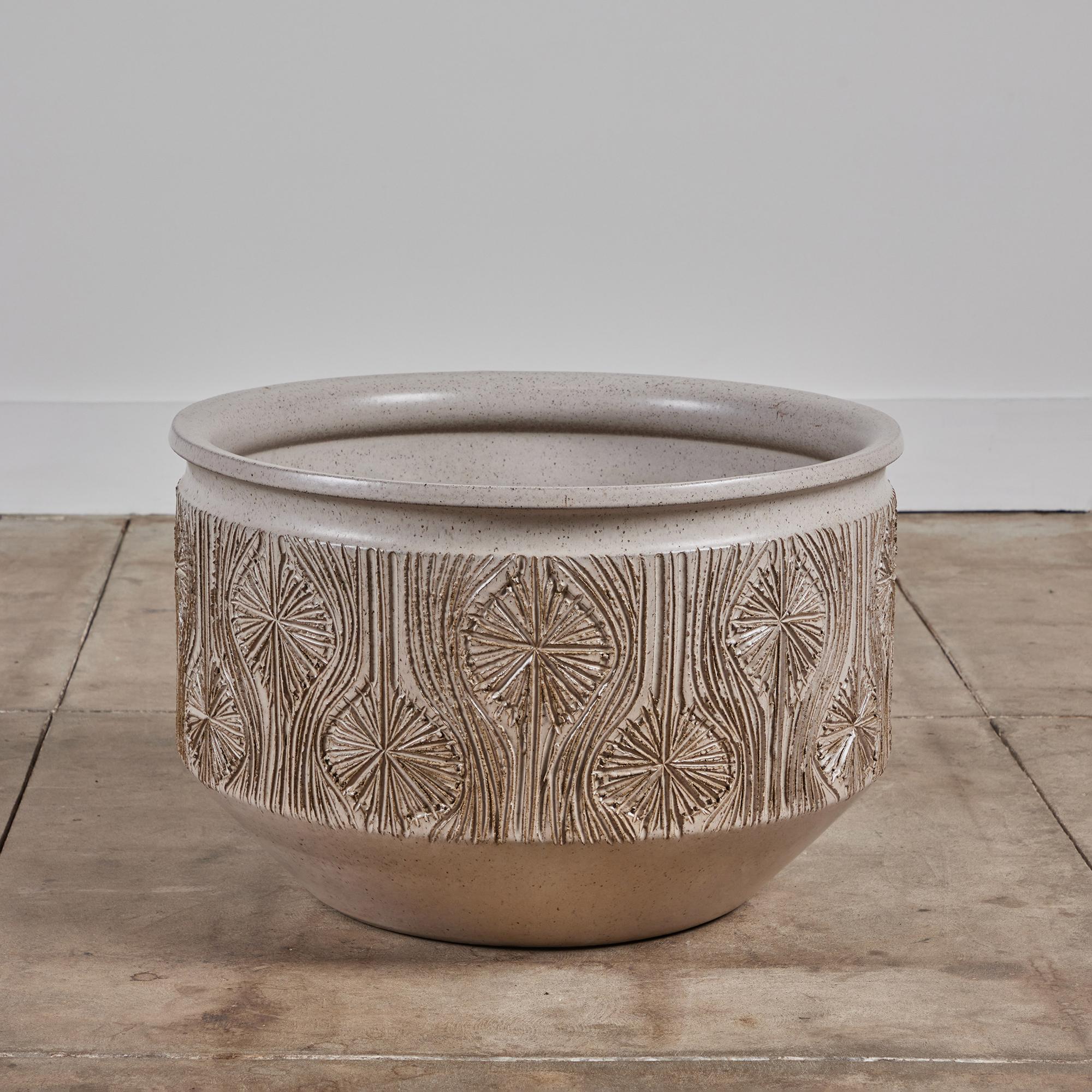 Bowl planter from Earthgender, David Cressey and Robert Maxwell’s early 1970s project. This 23.5” diameter example is incised in the “Teardrop Sunburst” design with interlocking gestural curves separating a pattern of lines radiating from a central
