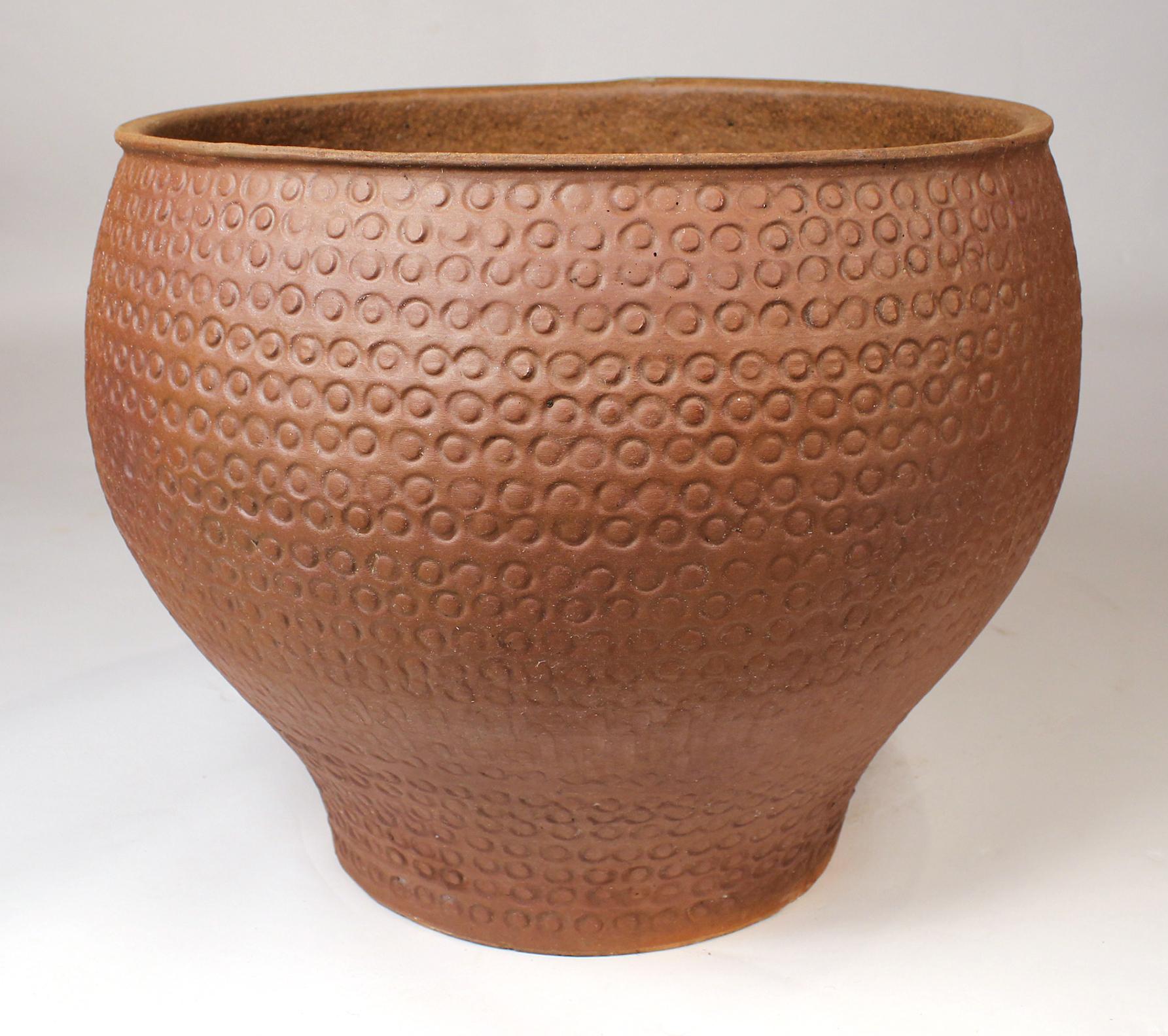 Unglazed 1960s David Cressey designed stoneware vessel from the Pro-Artisan series for architectural pottery. This example has the circles or 'Cheerio' pattern. Excellent original condition.