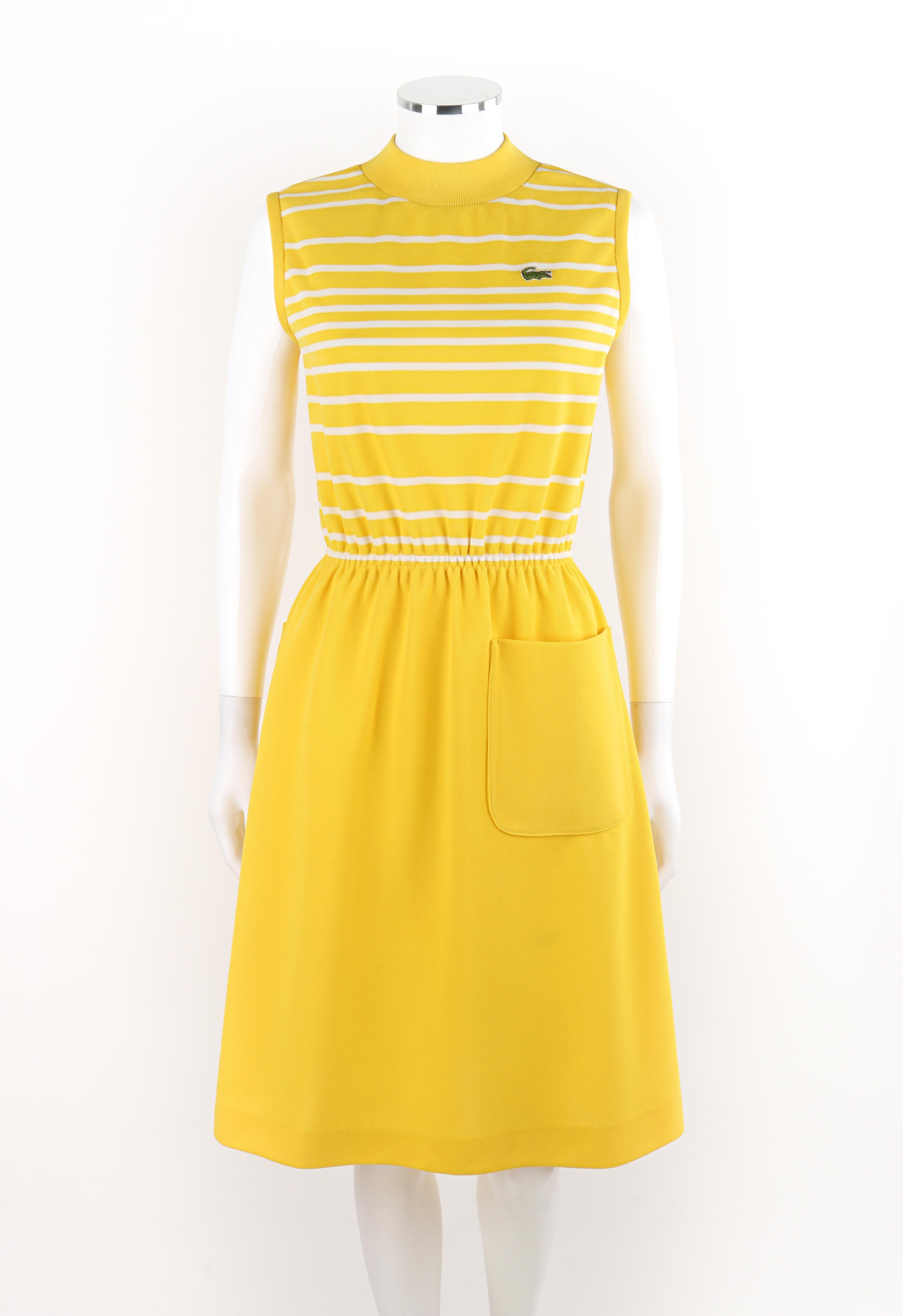 DAVID CRYSTAL LACOSTE c.1960's Yellow White Striped Knee Length Polo Sport Dress

Brand / Manufacturer: David Crystal, Lacoste
Circa: 1960's
Designer: Jean Patou
Style: Polo dress
Color(s): Shades of yellow, white, green
Lined: No
Unmarked Fabric