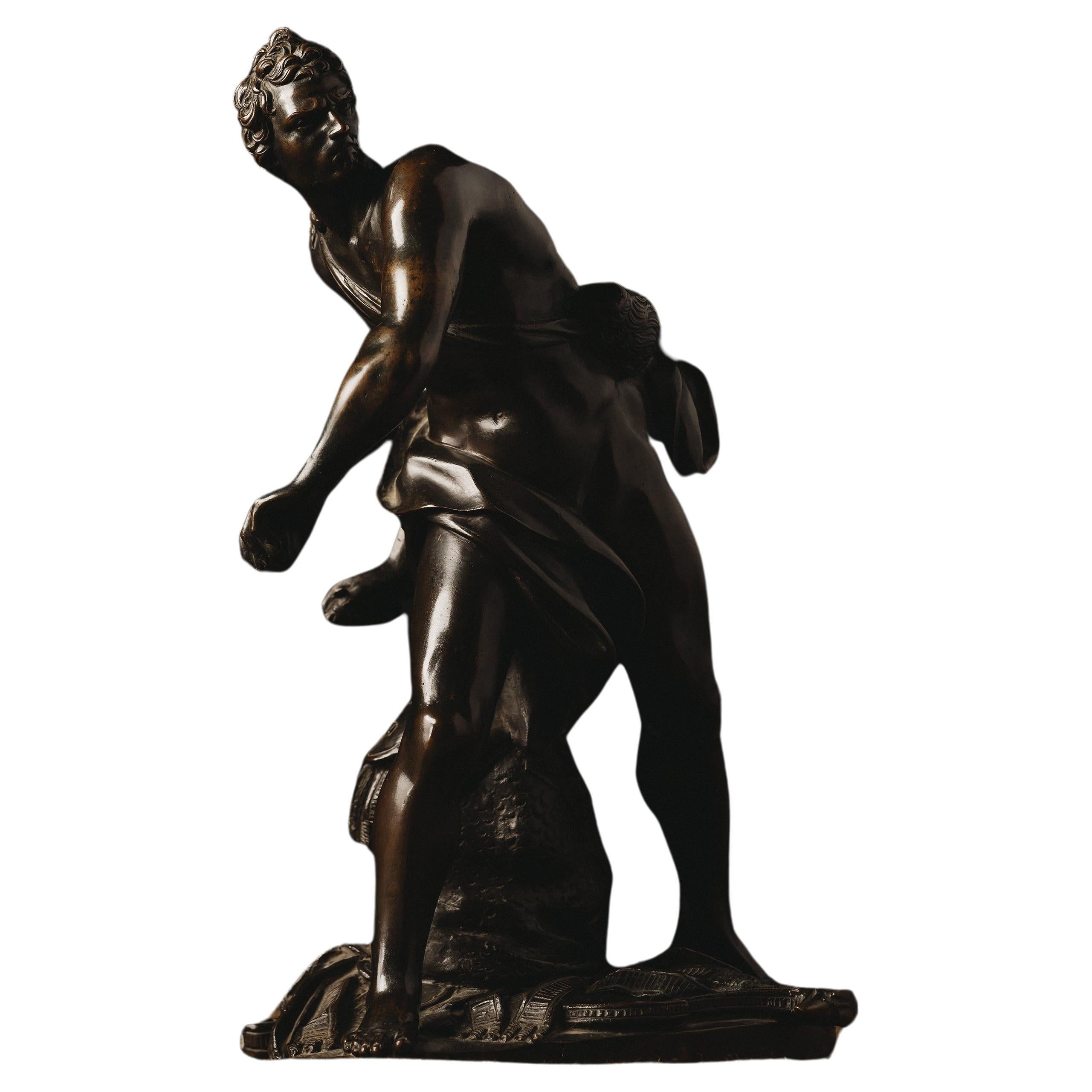 David Defeating Goliath: Patinated Bronze Sculpture from 19th Century France For Sale