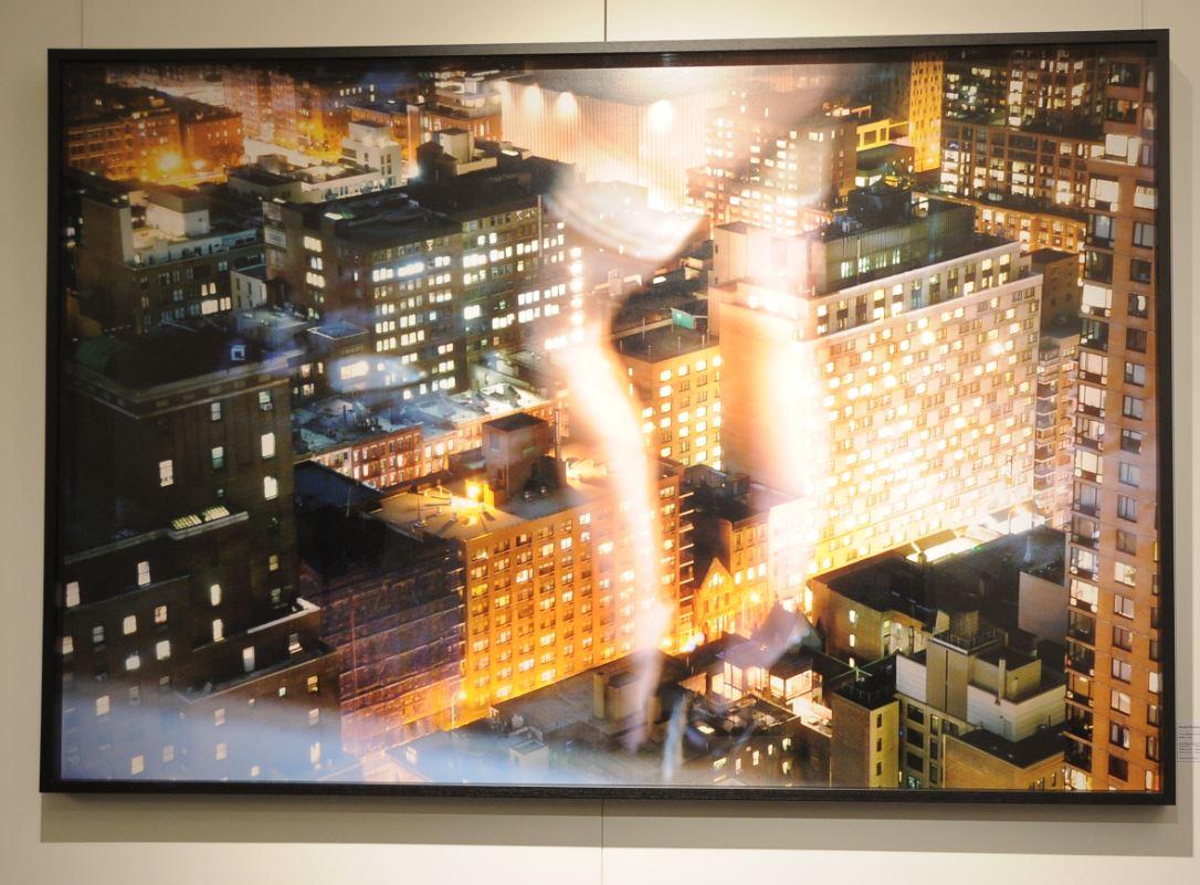 David Drebin Landscape Photograph - Flashing the City - urban landscape at night with skyscrapers and nude legs
