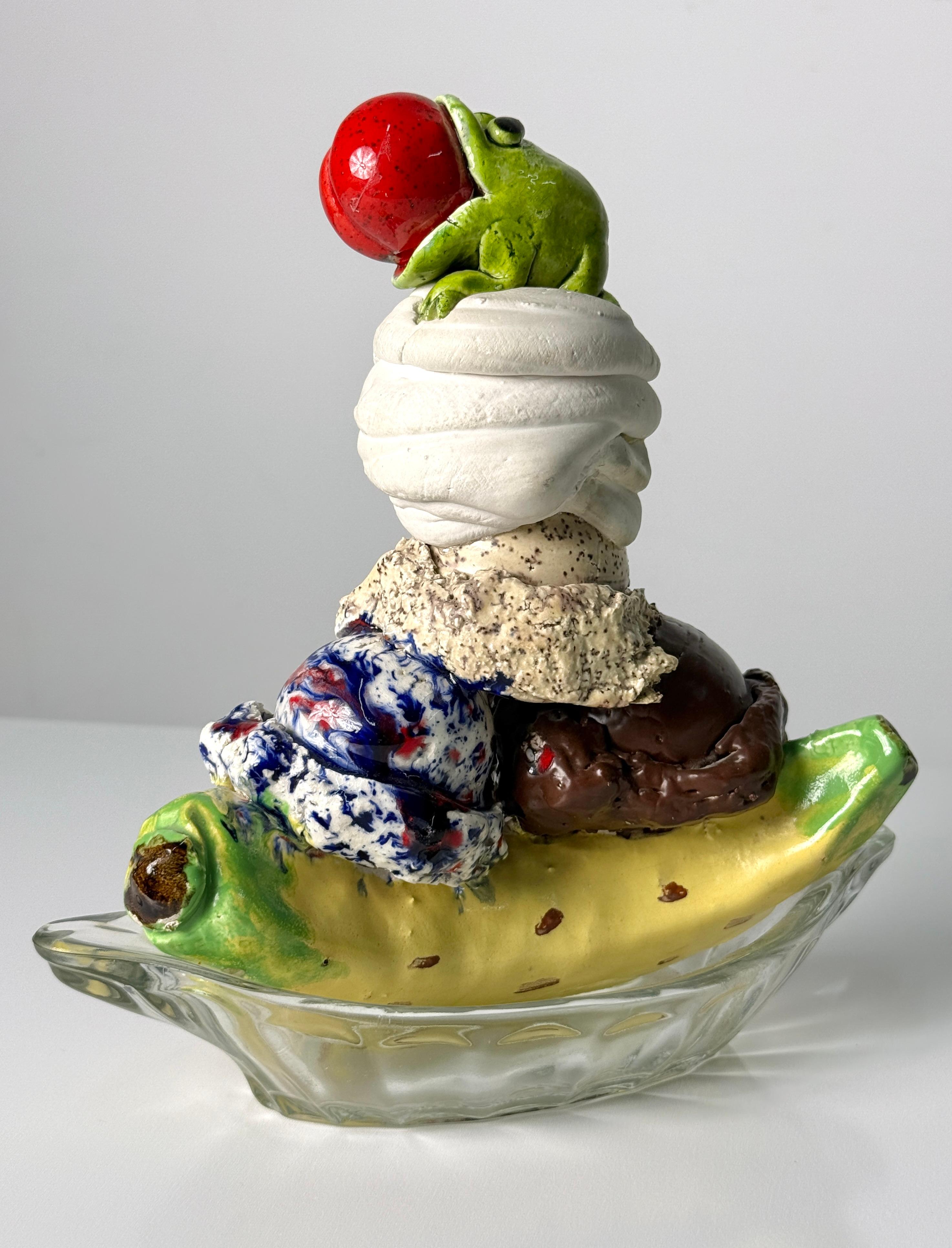 David Gilhooly (1943-2013)
Frog Ice Cream Sundae

1983
Glazed Earthenware
9.5 w x 4 d x 9.5 h in

David Gilhooly (1943–2013) was an American ceramic sculptor and key figure in the Funk Art movement of the 1960s. Born in California, and student of