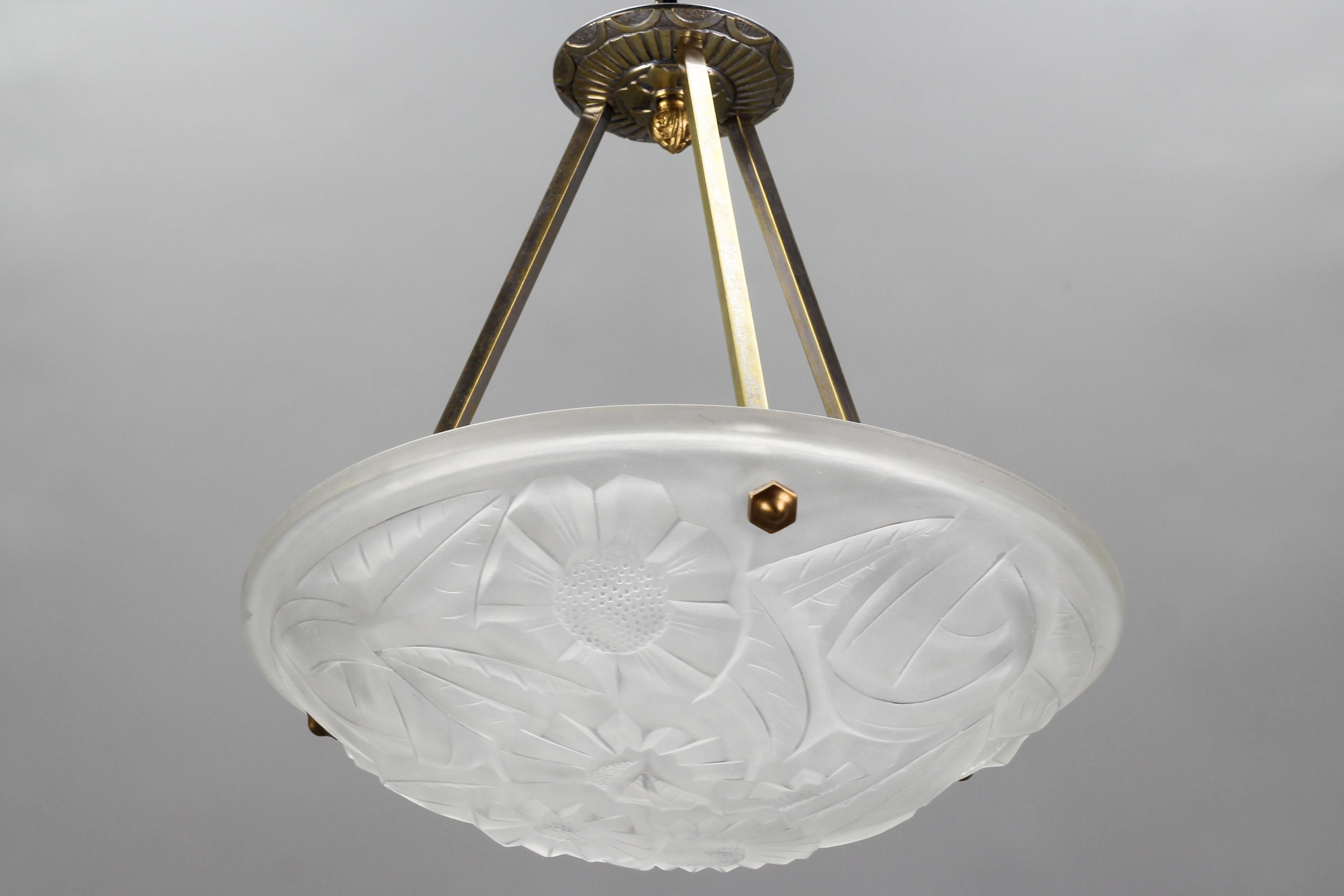 French Art Deco pendant chandelier with clear frosted glass shade signed Degué by Verrerie D'Art Degué. Beautifully shaped glass shade features stylized flower motifs, glass surface signed 