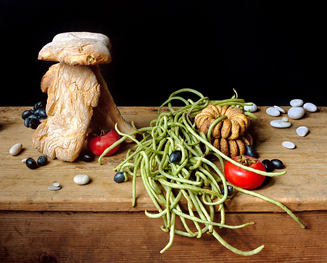 David Halliday Still-Life Photograph - Bread House (Framed Food Still Life Photograph of Bread, Vegetables & Stones)