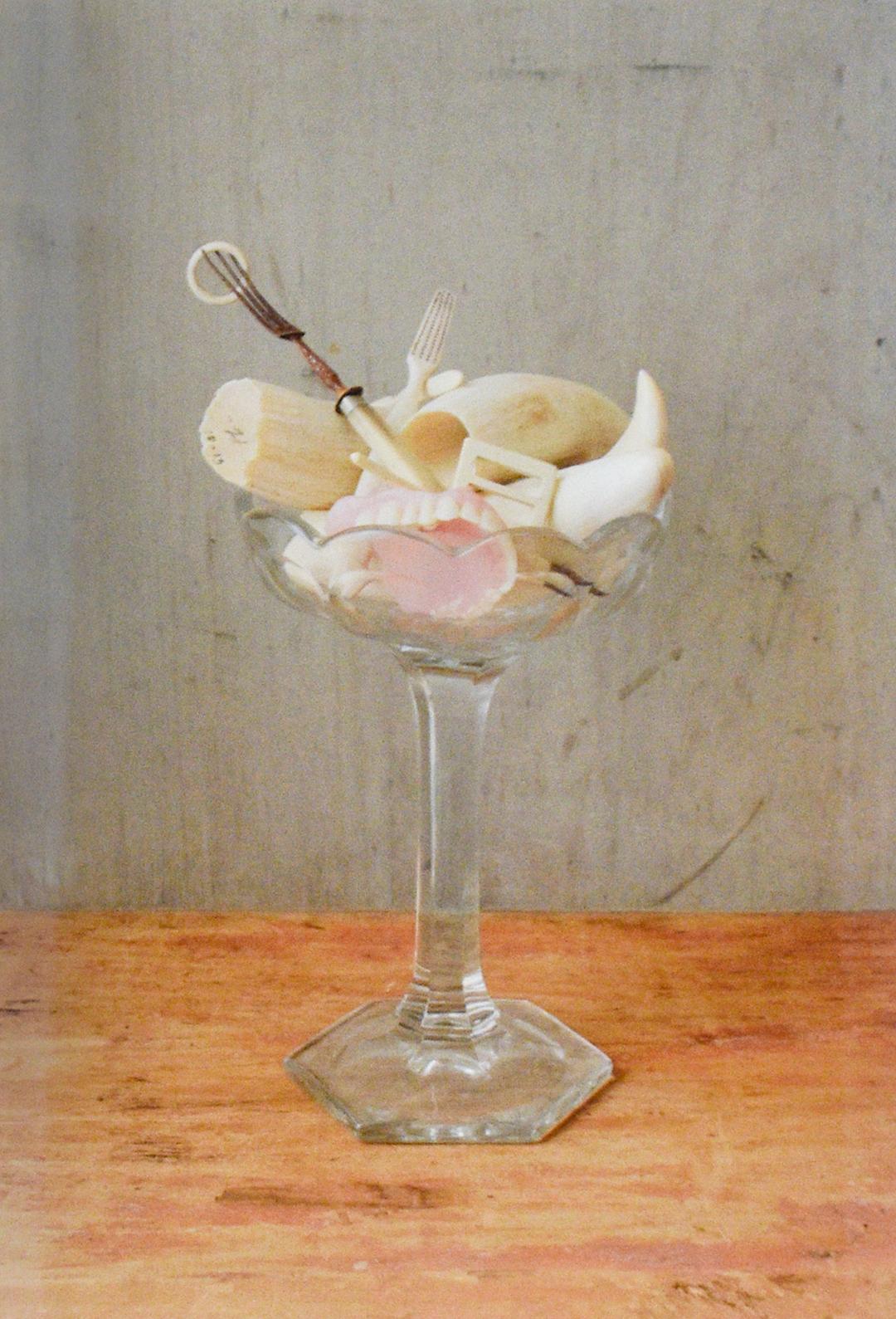 Compote with Teeth (Still Life Photograph of White Teeth in a Glass Cup)