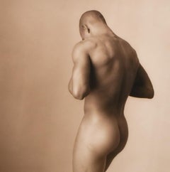Vintage Male Nude with Head Down (Sepia Toned Figurative Photograph by David Halliday)