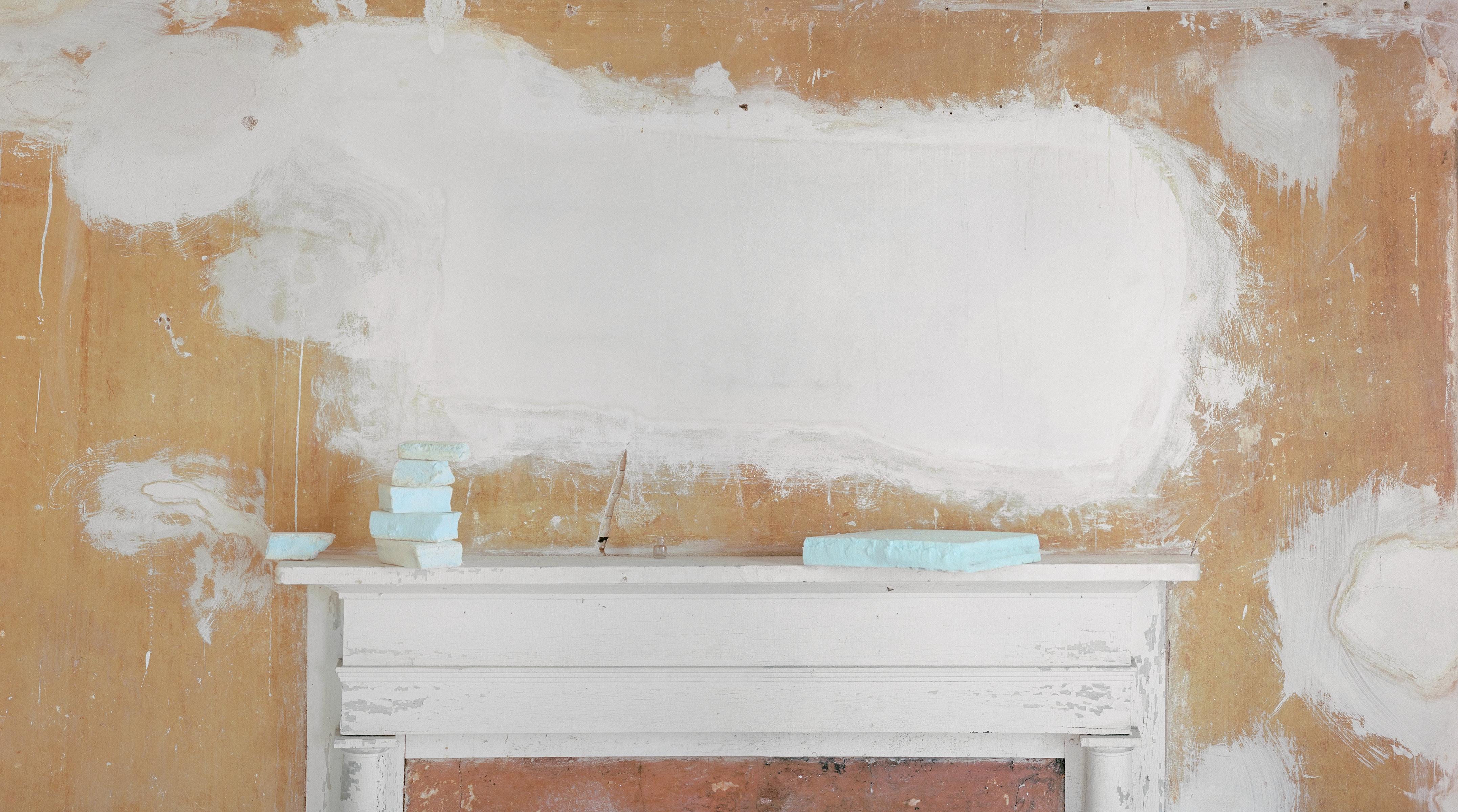 David Halliday Still-Life Photograph - Plaster Clouds (Photograph of an Exposed Wall and Antique Mantle Piece)