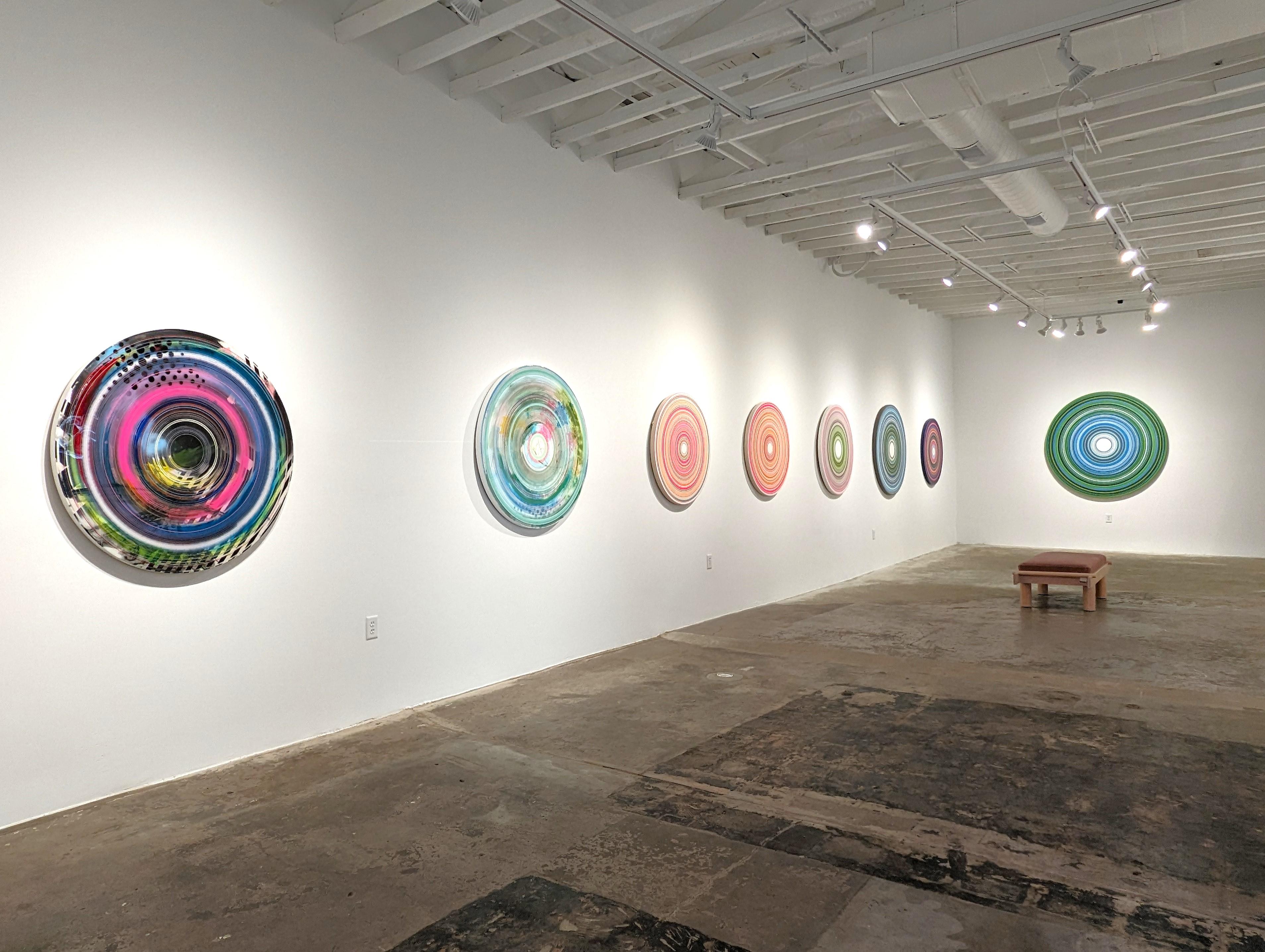 Colorful abstract contemporary circular painting by Houston, TX artist David Hardaker. Signed, titled, and dated by the artist on the reverse. Currently on view in 