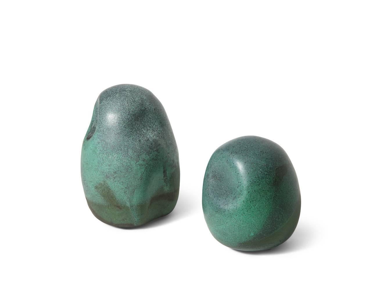 Ceramic rocks by David Haskell.
Abstract ceramic forms resembling rocks. Wheel-thrown with great green glaze. Each one signed on underside.
Measures: Larger height 7.75