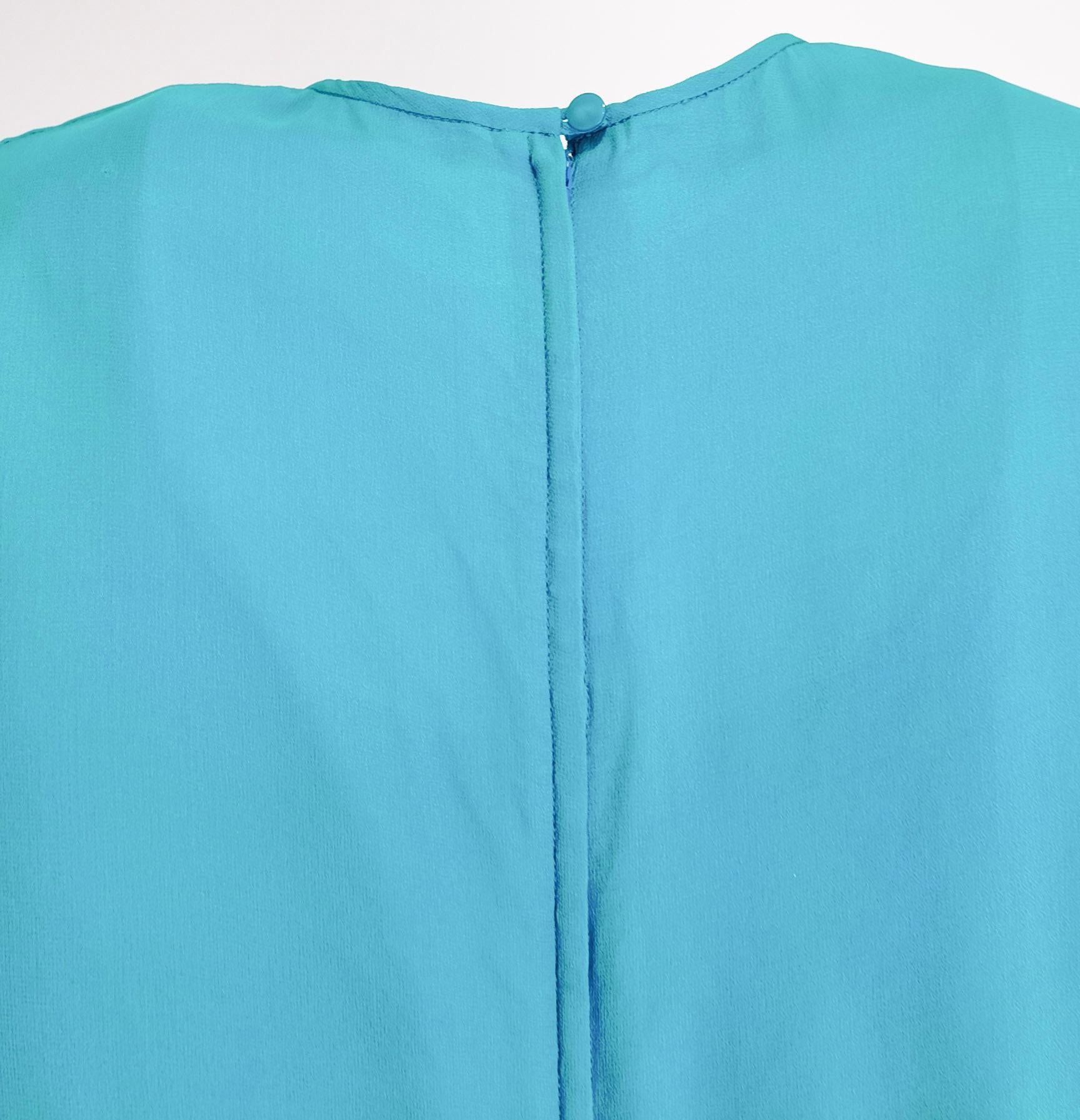 Conjunto de top y pantalón plisado turquesa David Hayes en venta 1