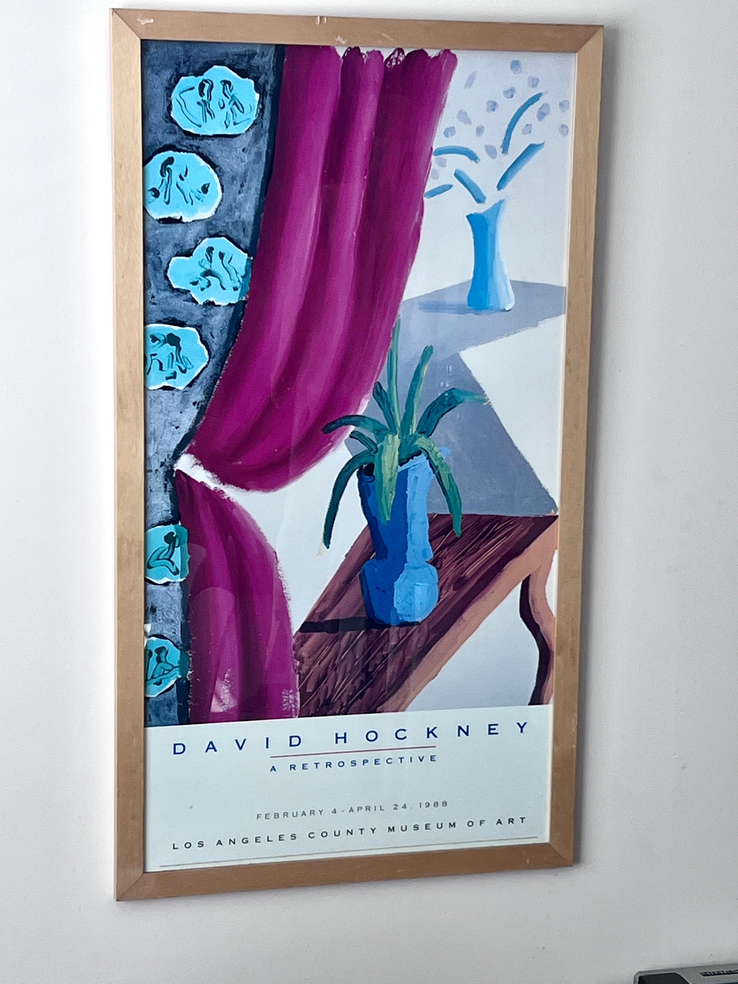 A rare Poster from David Hockney's Restrospecive at Los Angeles County Museum, ie, LACMA.... the poster is from the 1988 Exhibit and the framed poster was one that actually was used in the retrospective at the Museum in Los Angeles.

The art used in