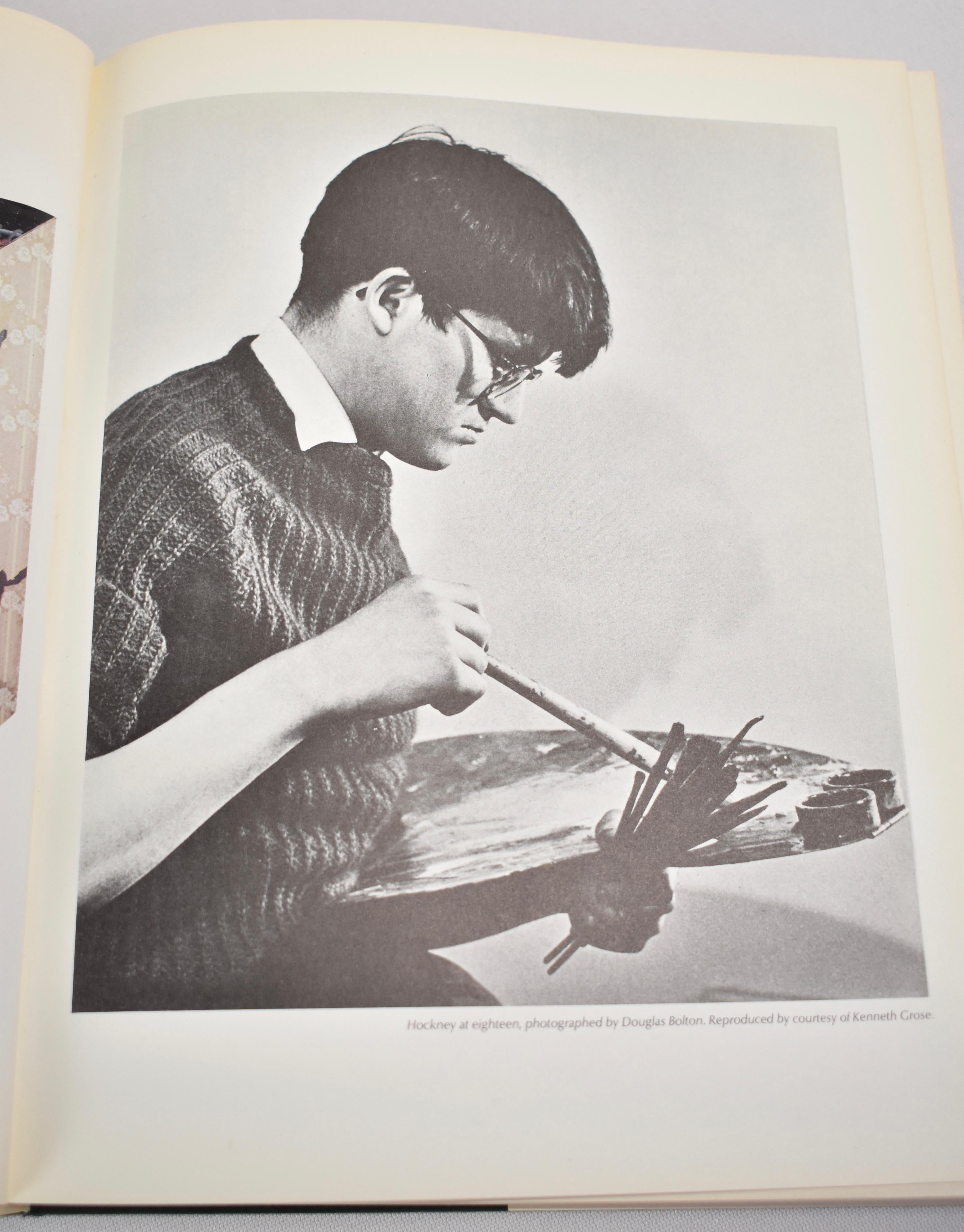 Hardback coffee table book containing the autobiographical work of artist, David Hockney. By David Hockney, published in 1976. First edition, 312 pages.

