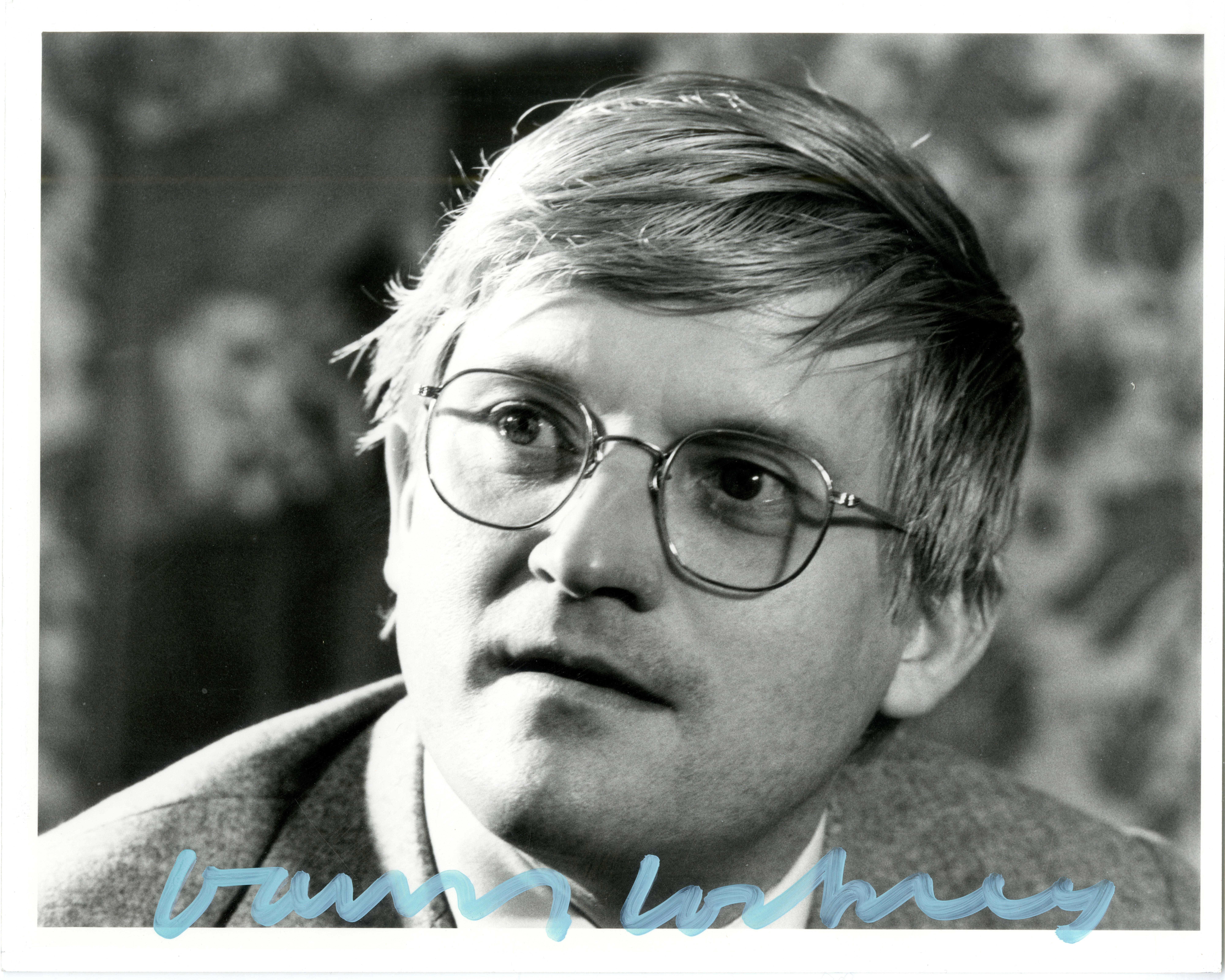 David Hockney
Photograph taken of the artist (hand signed by David Hockney), ca. 1981
Black and white photograph
Boldly signed in blue grease marker on the lower front
8 × 10 inches
Unframed
This is an 8 x 10 photograph of the artist that he has