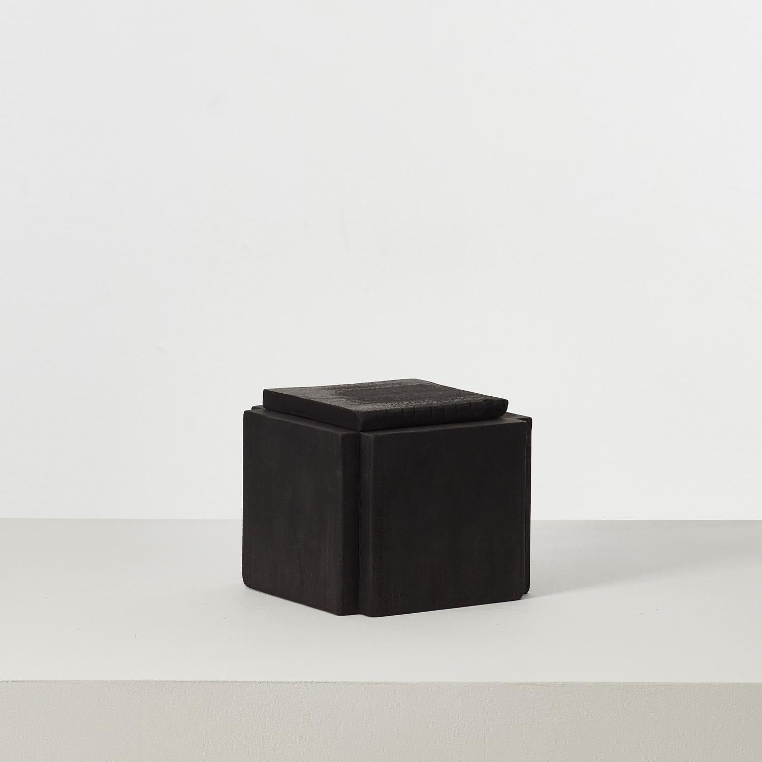 This collection of charred wood vessels has been coaxed from an assortment of offcuts found in David Horan’s workshop. The dimensions of each piece of sapele, cherry and London plane are subject to a formula devised by the designer, which defines