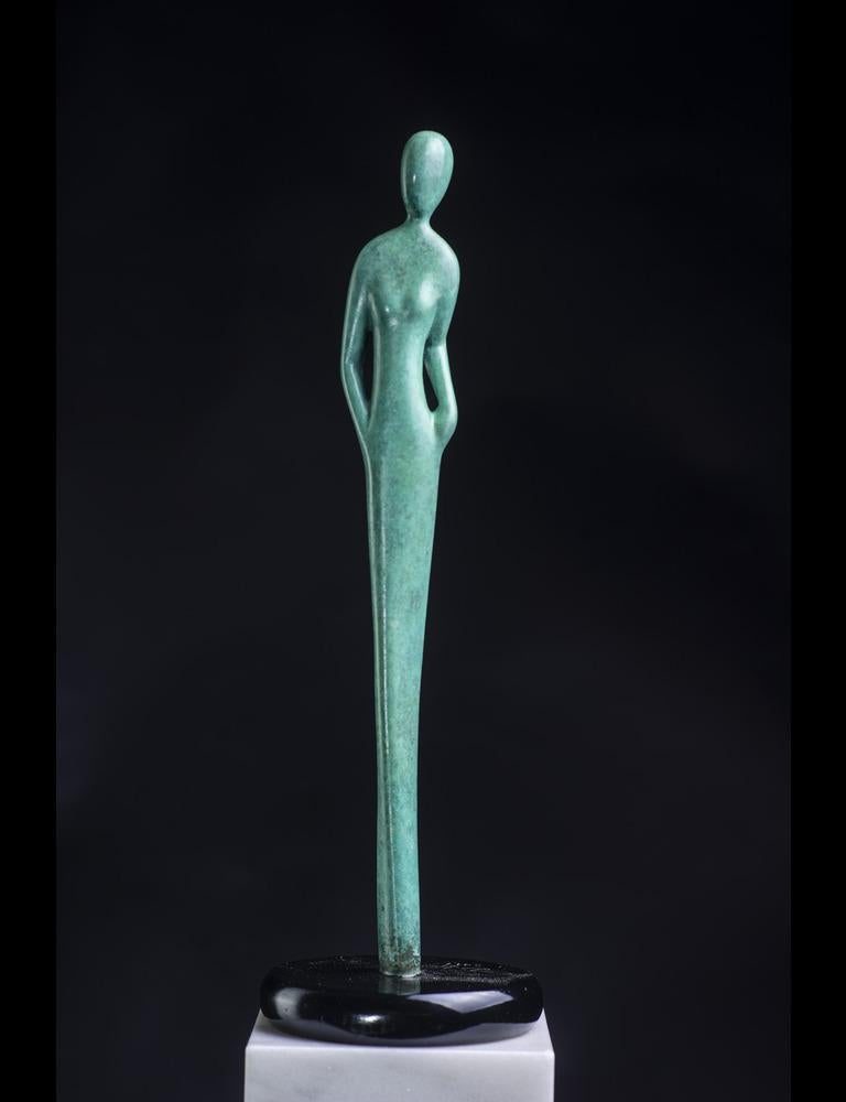 The Classic Lady bronze was cast from a wood carving. She is David's most petite sculpture. Movement and grace with the twist at the waist and tilt of the head. She can add beauty to any place in your home or office. I have placed her on a marble