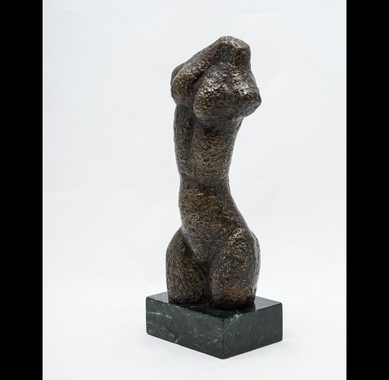 David Hostetler created this form originally in ceramic in 1948. He used the mold in the 1980's to cast a bronze. It has a green marble base that measures 2